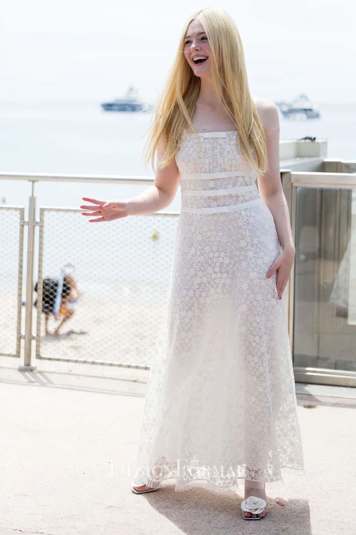 Elle Fanning a line 76th Annual Cannes Film Festival dress