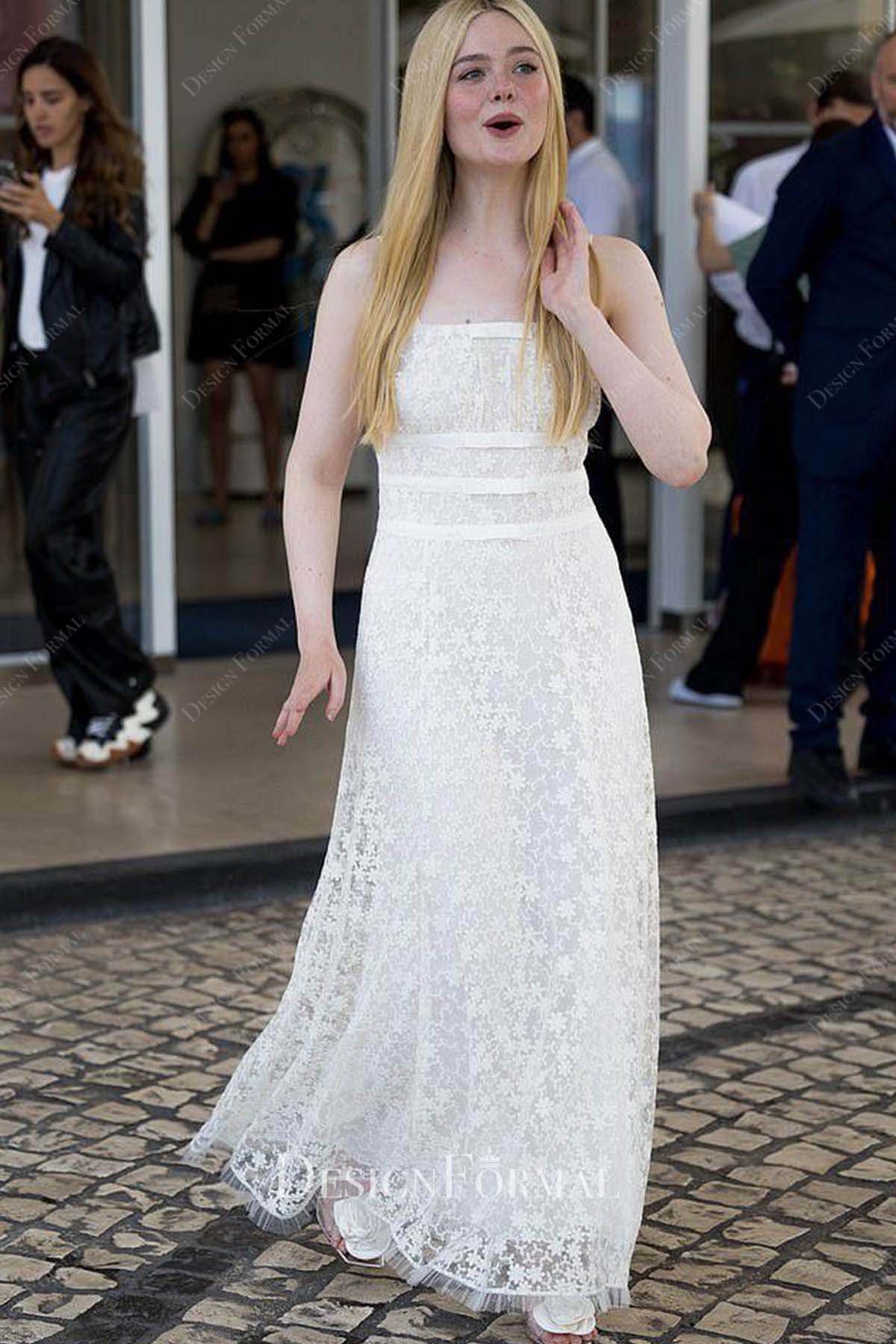 Elle Fanning white lace 76th Annual Cannes Film Festival dress