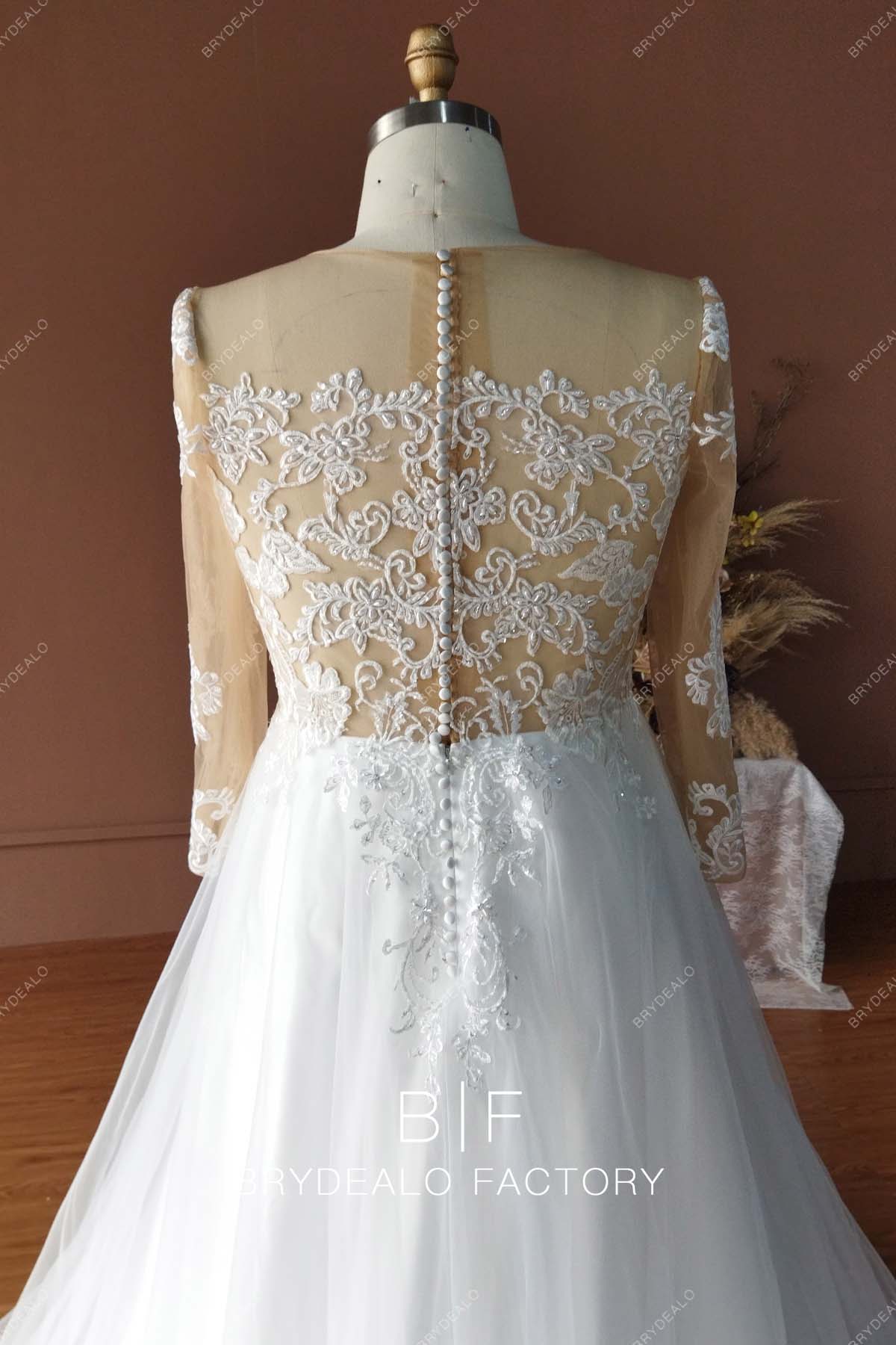 illusion back designer lace bridal gown