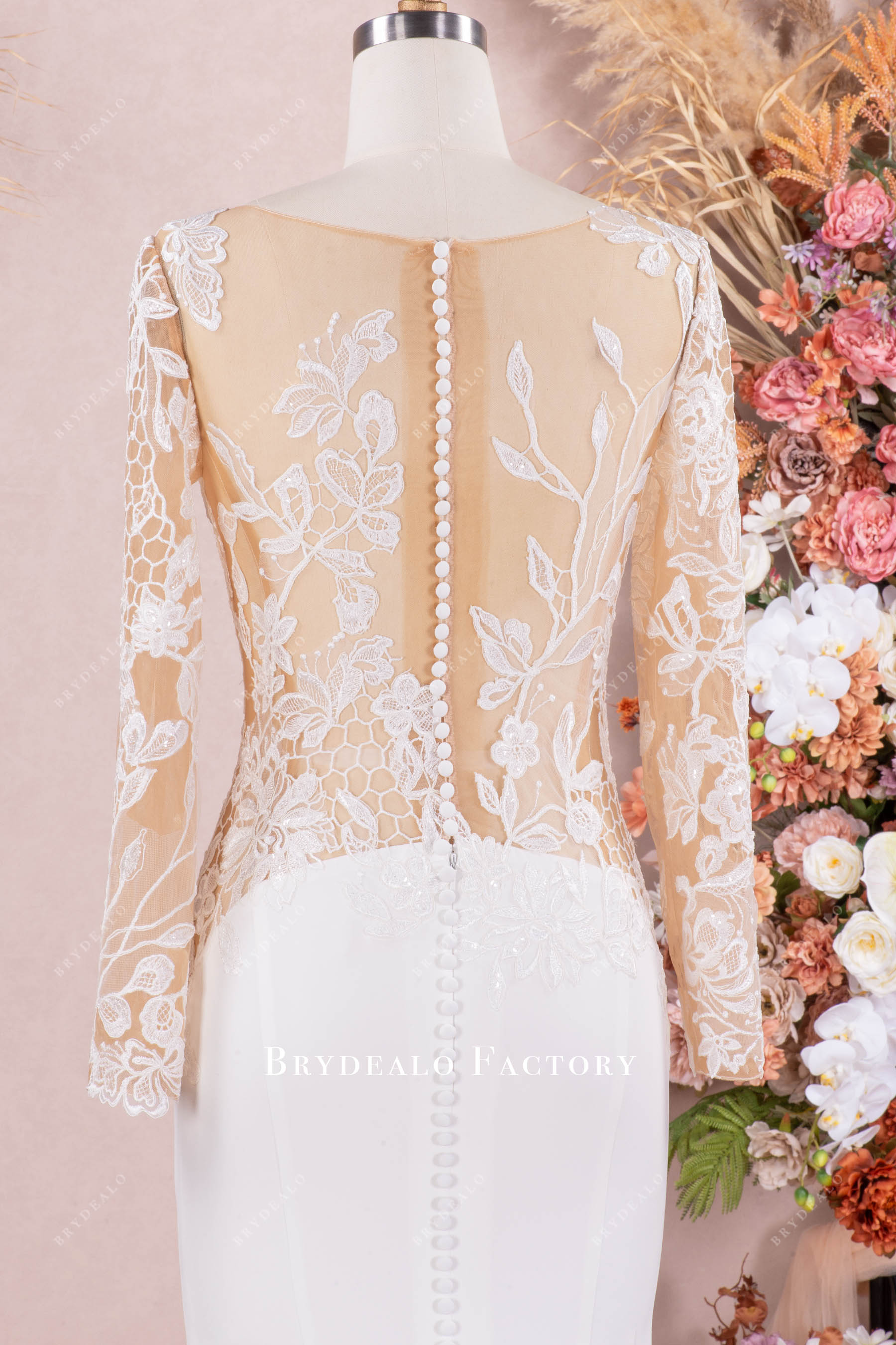 illusion buttoned back bridal dress