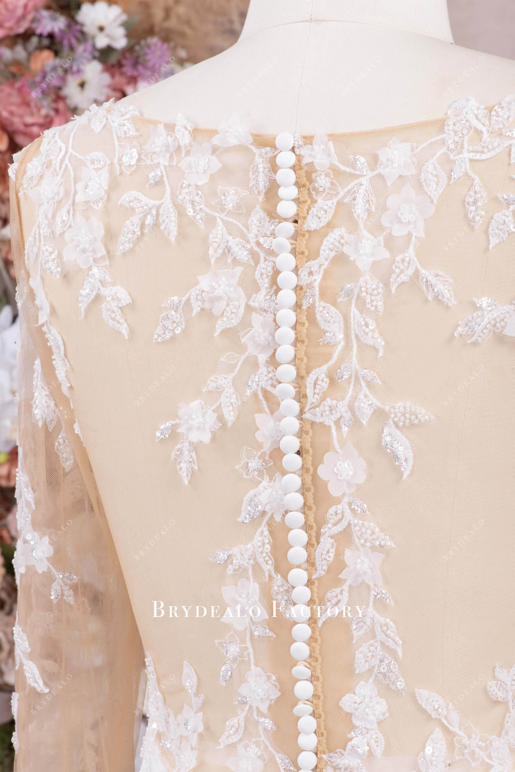 illusion buttoned back bridal dress