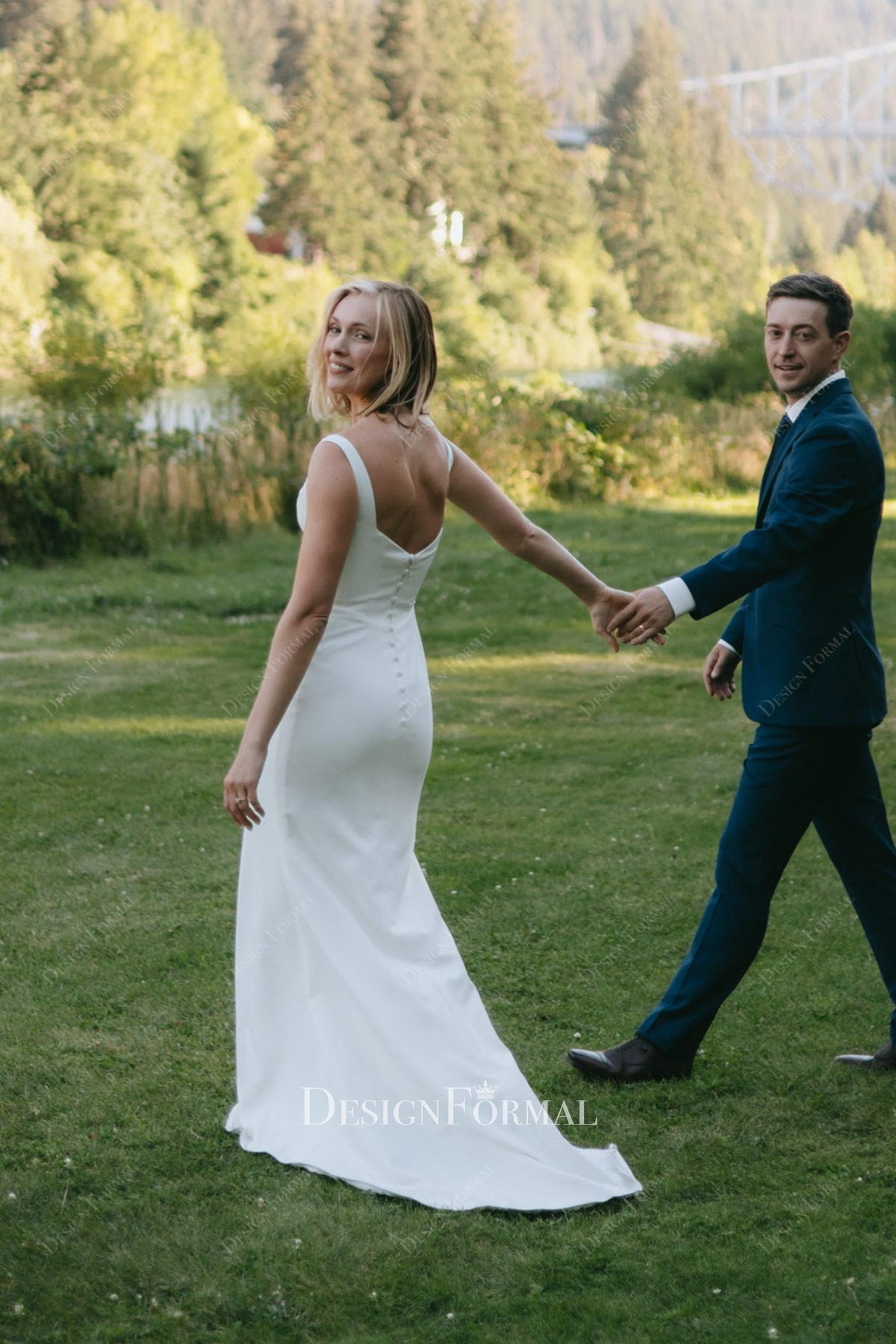 ivory crepe court train bridal gown