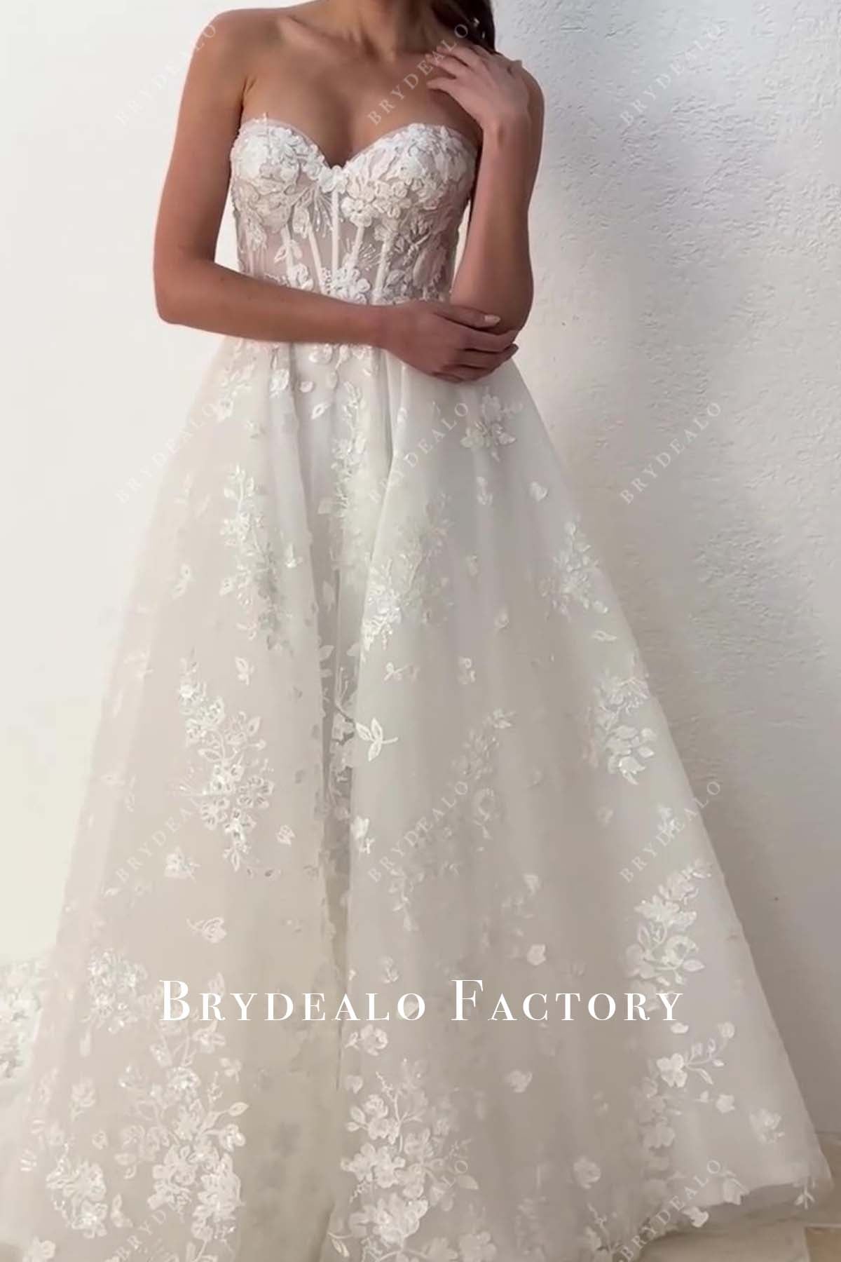 sleeveless sweetheart neck lace destination bridal gown