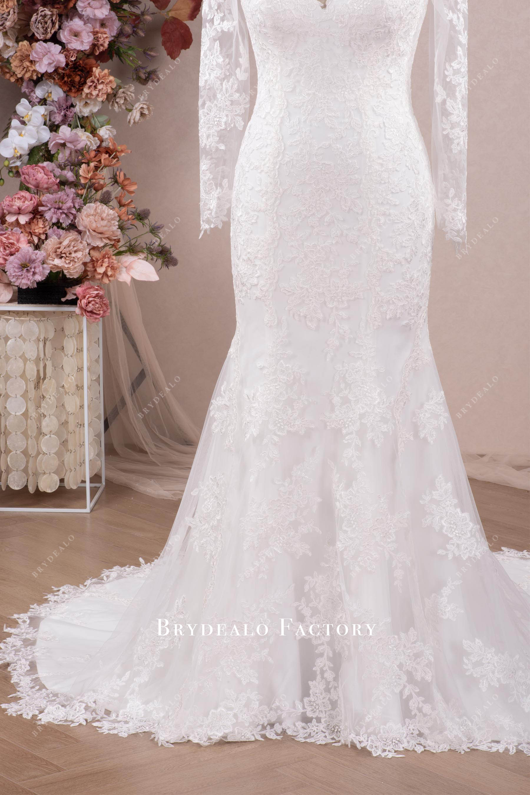 designer lace mermaid bridal gown