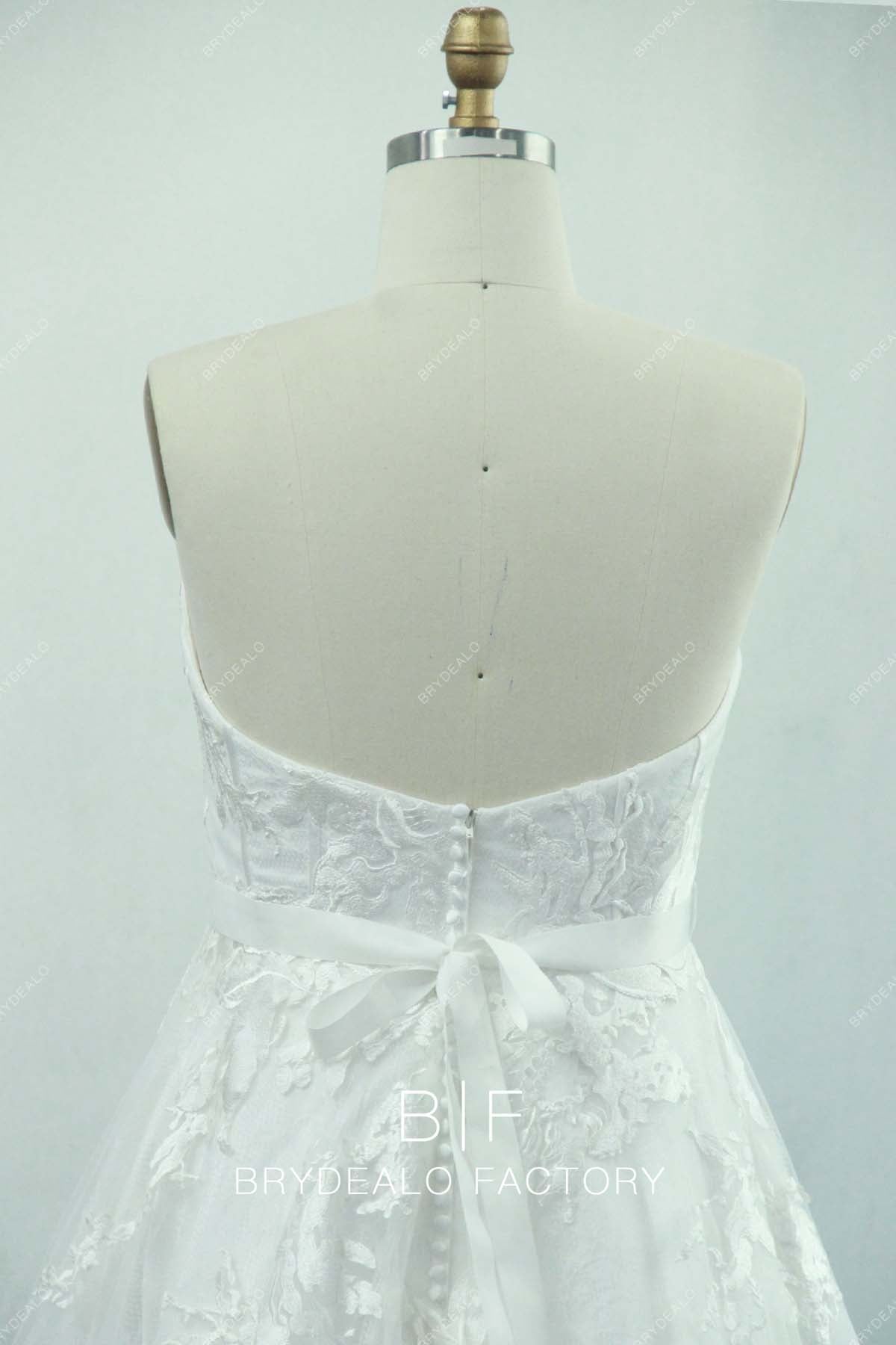 open back designer lace white bridal gown