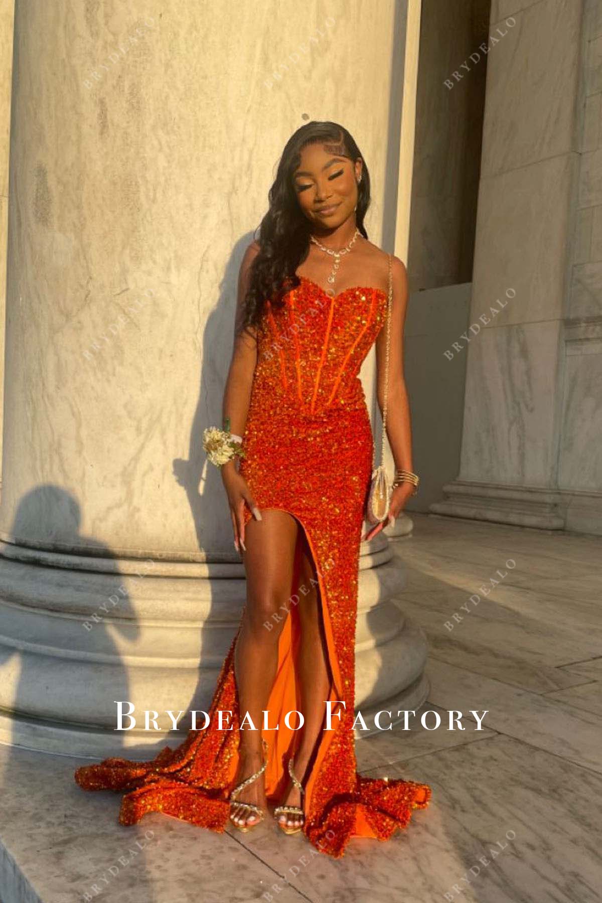 orange sequined strapless slit prom dress