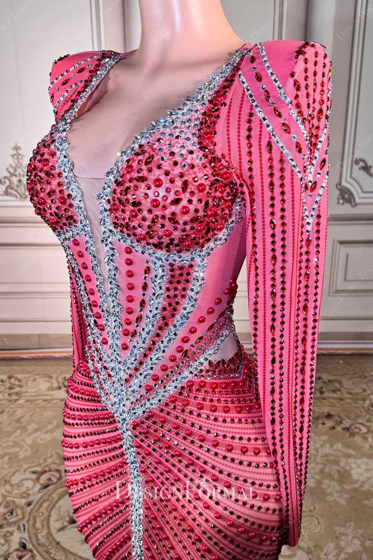 pink punch long sleeved prom dress