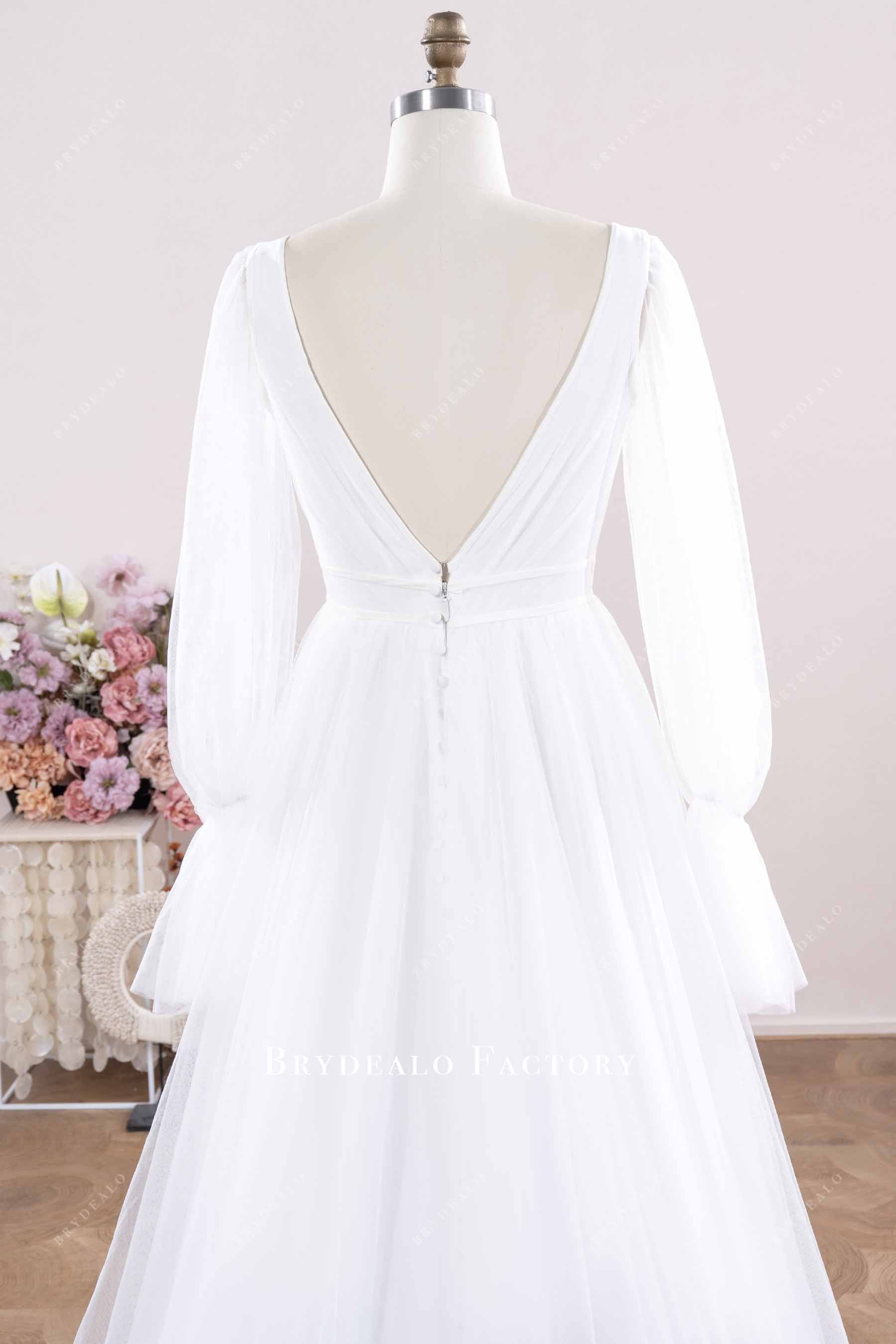 plunging back wedding dress