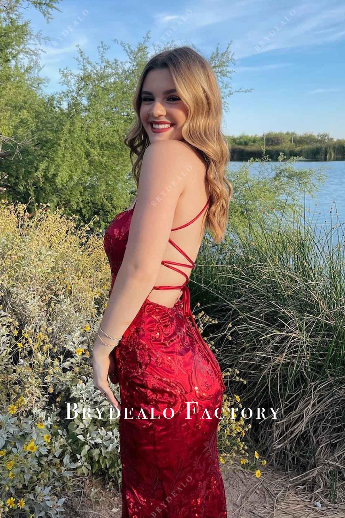 red crisscross back prom dress