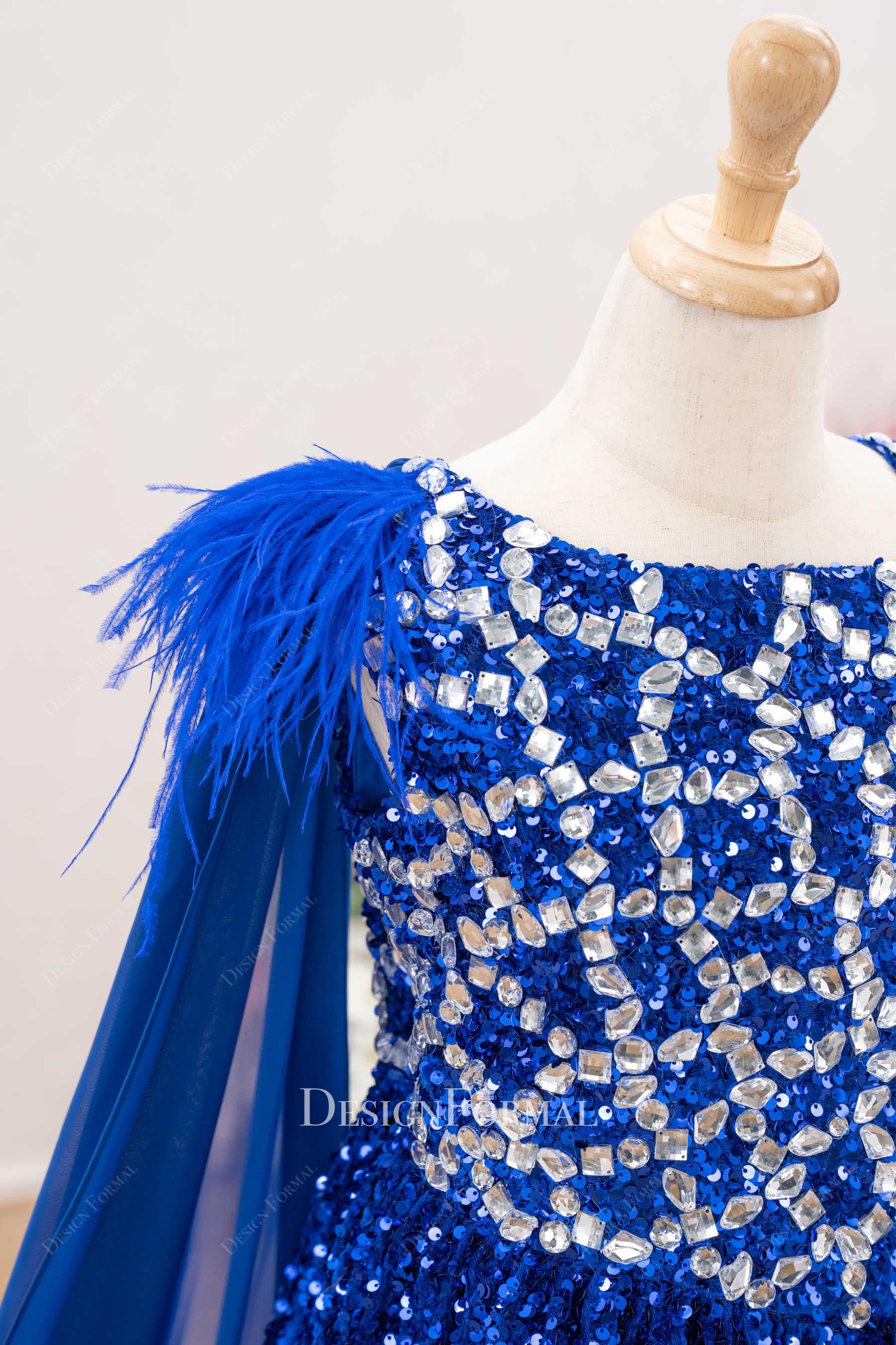 royal blue feathers crystals pageant dress