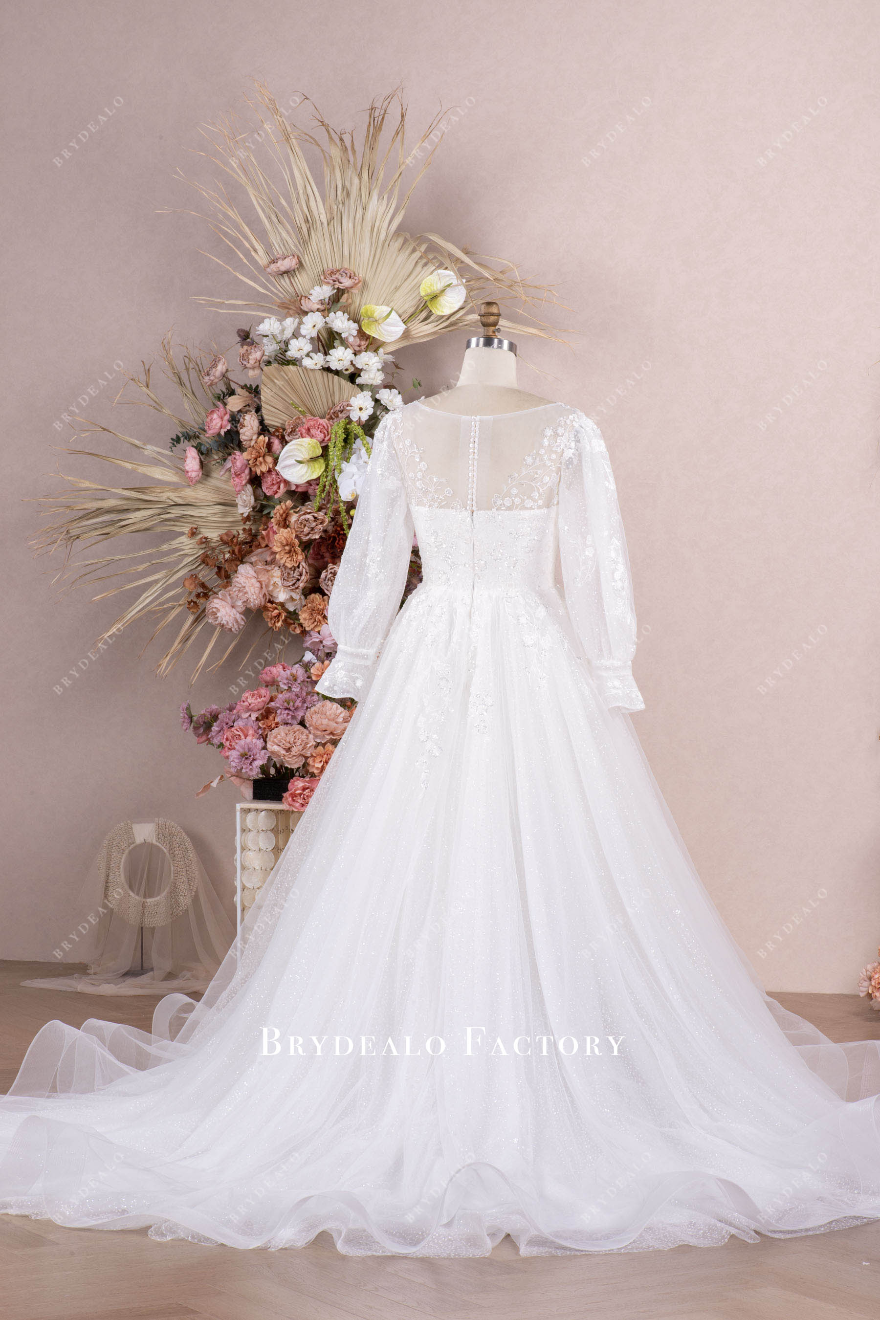 ruffled chapel train shimmery wedding dress