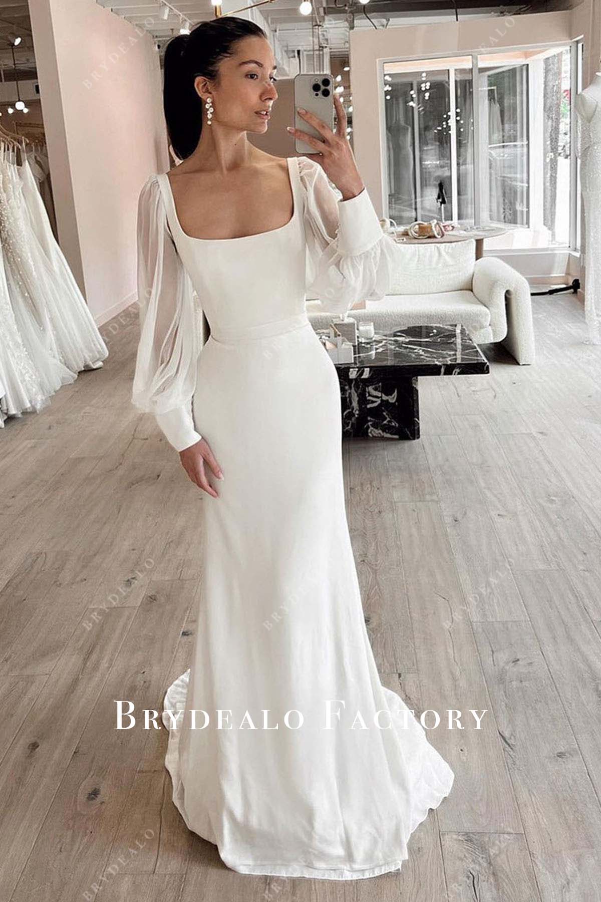 sheer bishop sleeves fit and flare bridal dress