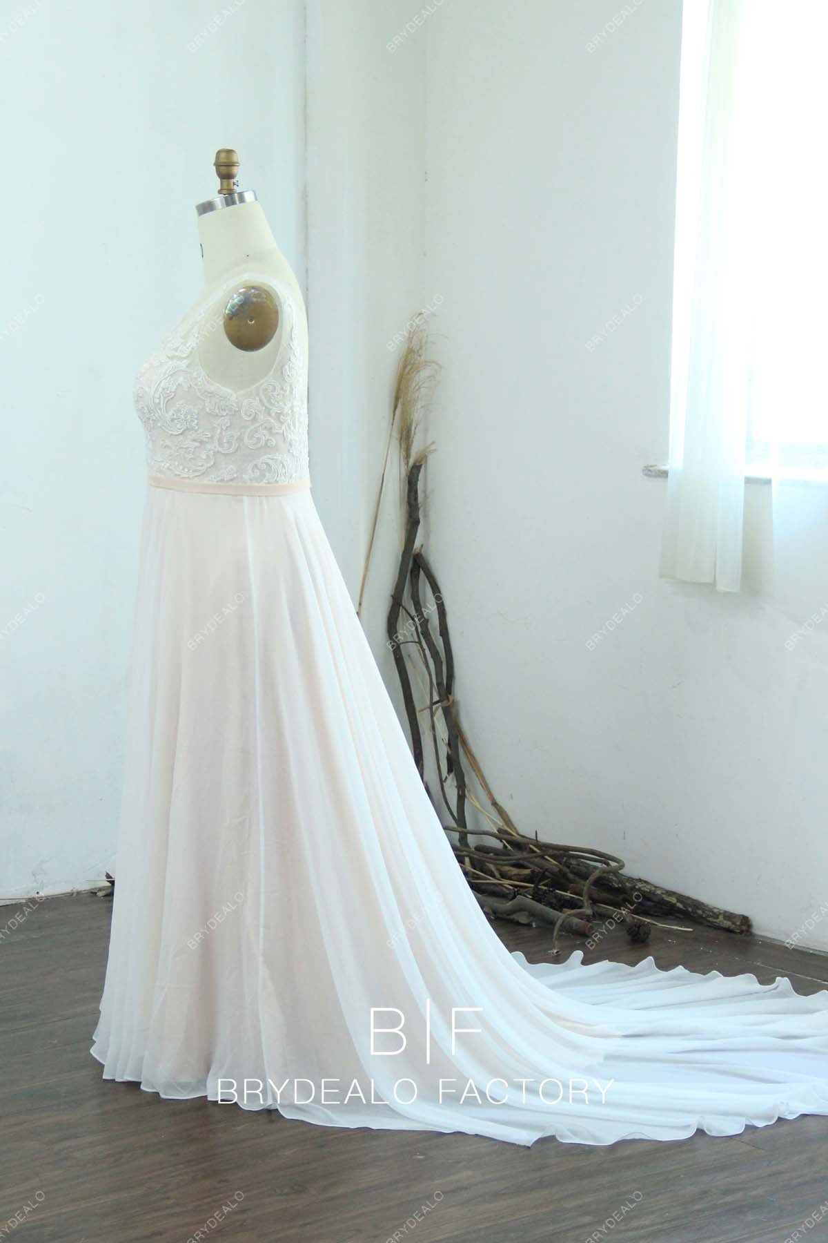 sleeveless white overlaid pearl pink long train bridal gown