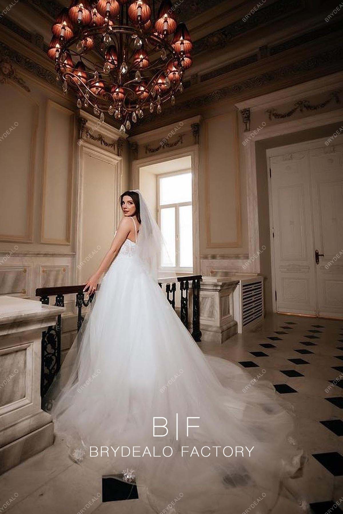 sleeveless tulle A-line destination wedding dress