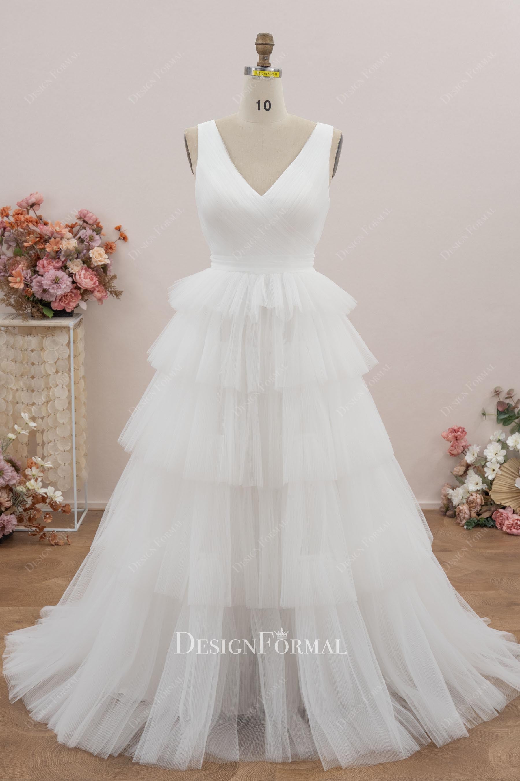 sleeveless tiered a line wedding dress