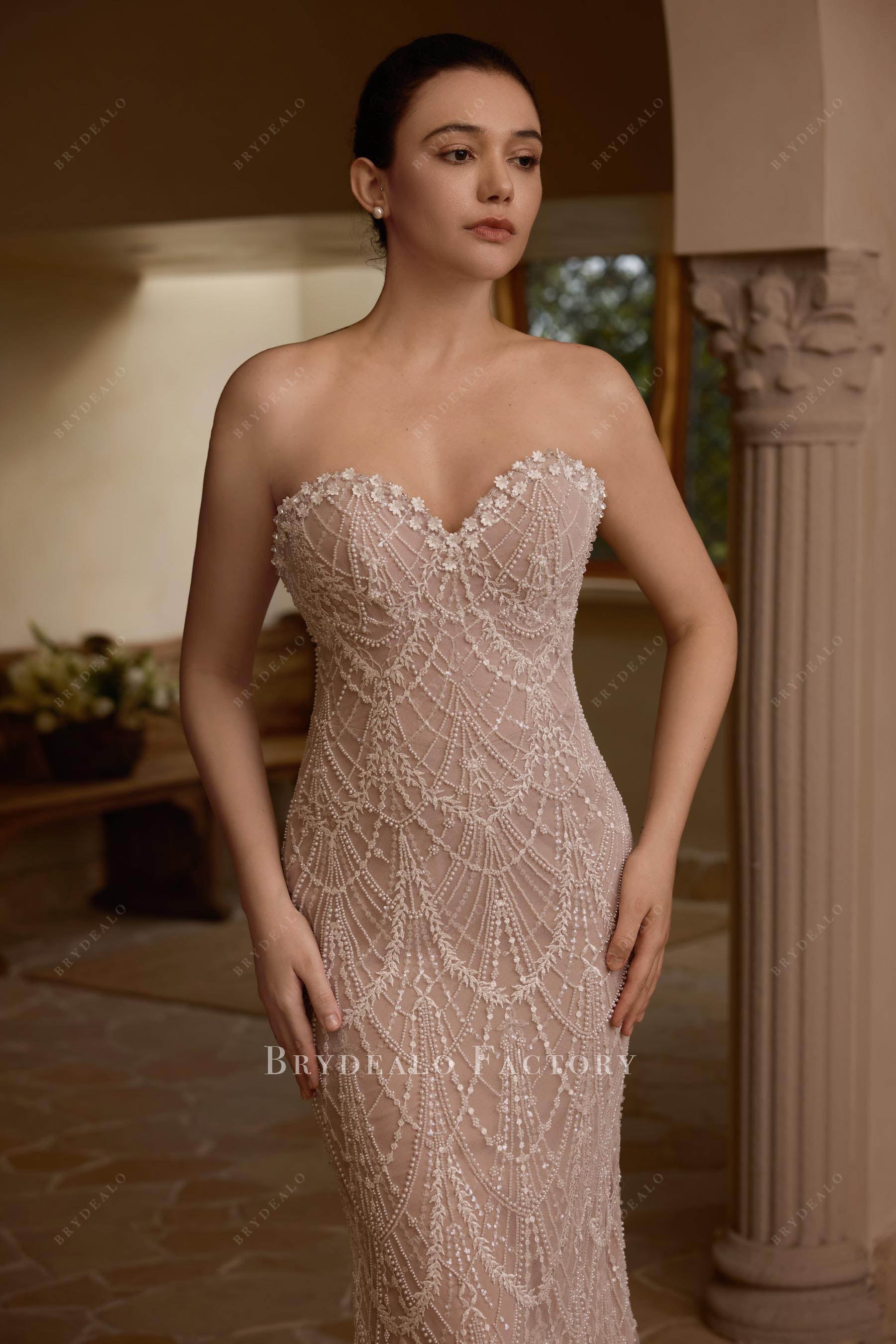 strapless beaded lace wedding gown