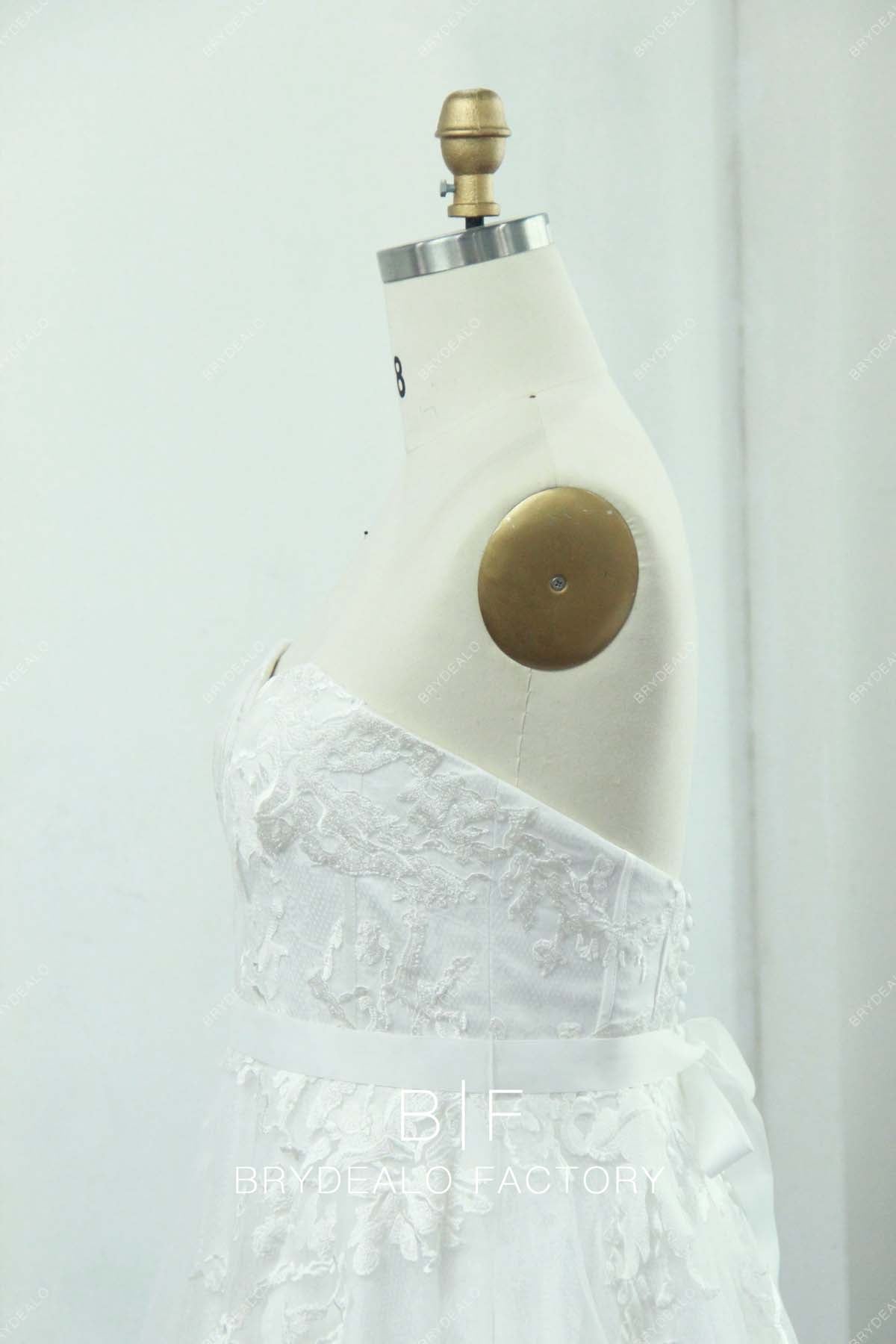 strapless white lace designer bridal gown
