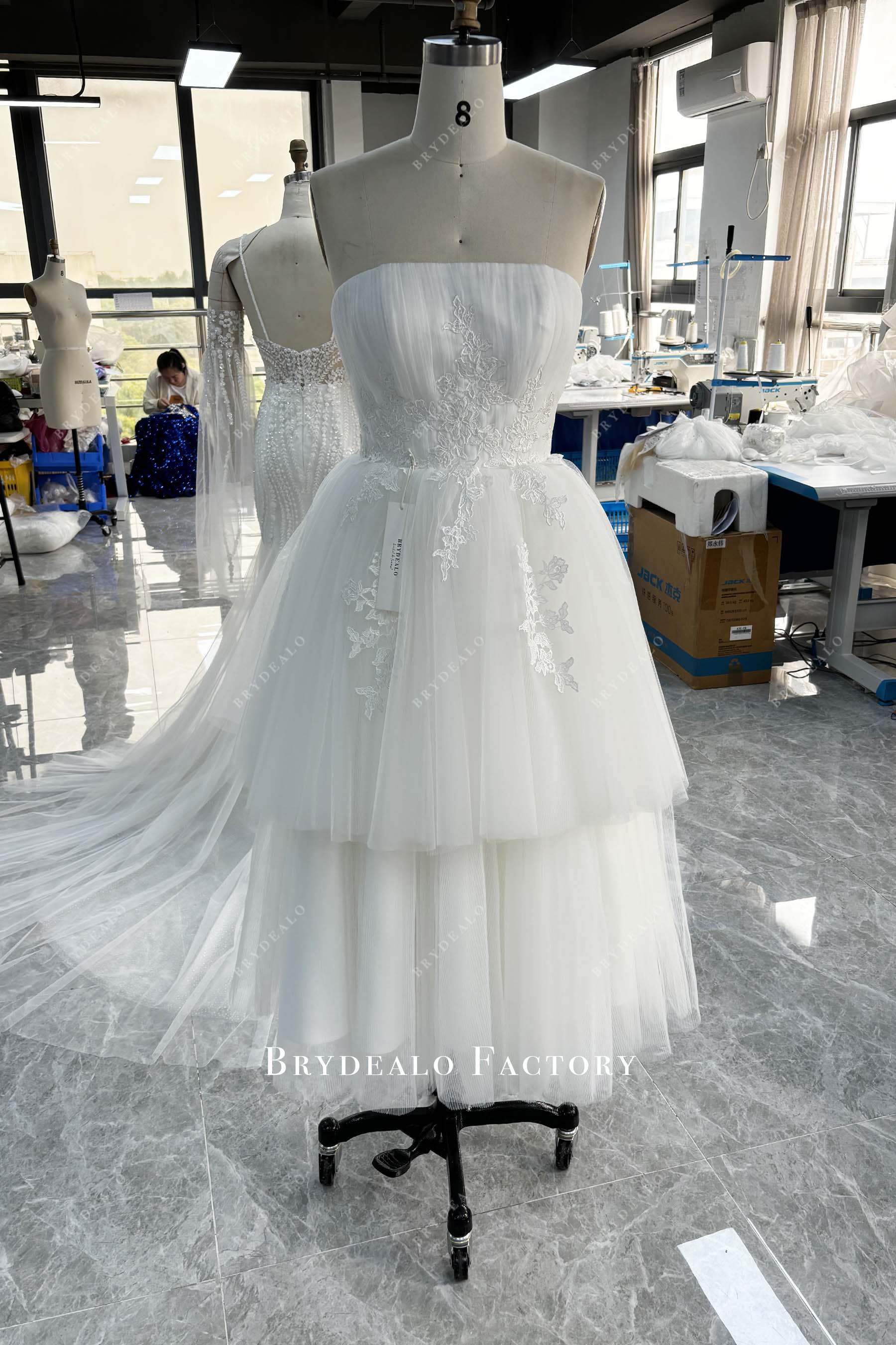 designer strapless tiered wedding ball gown 