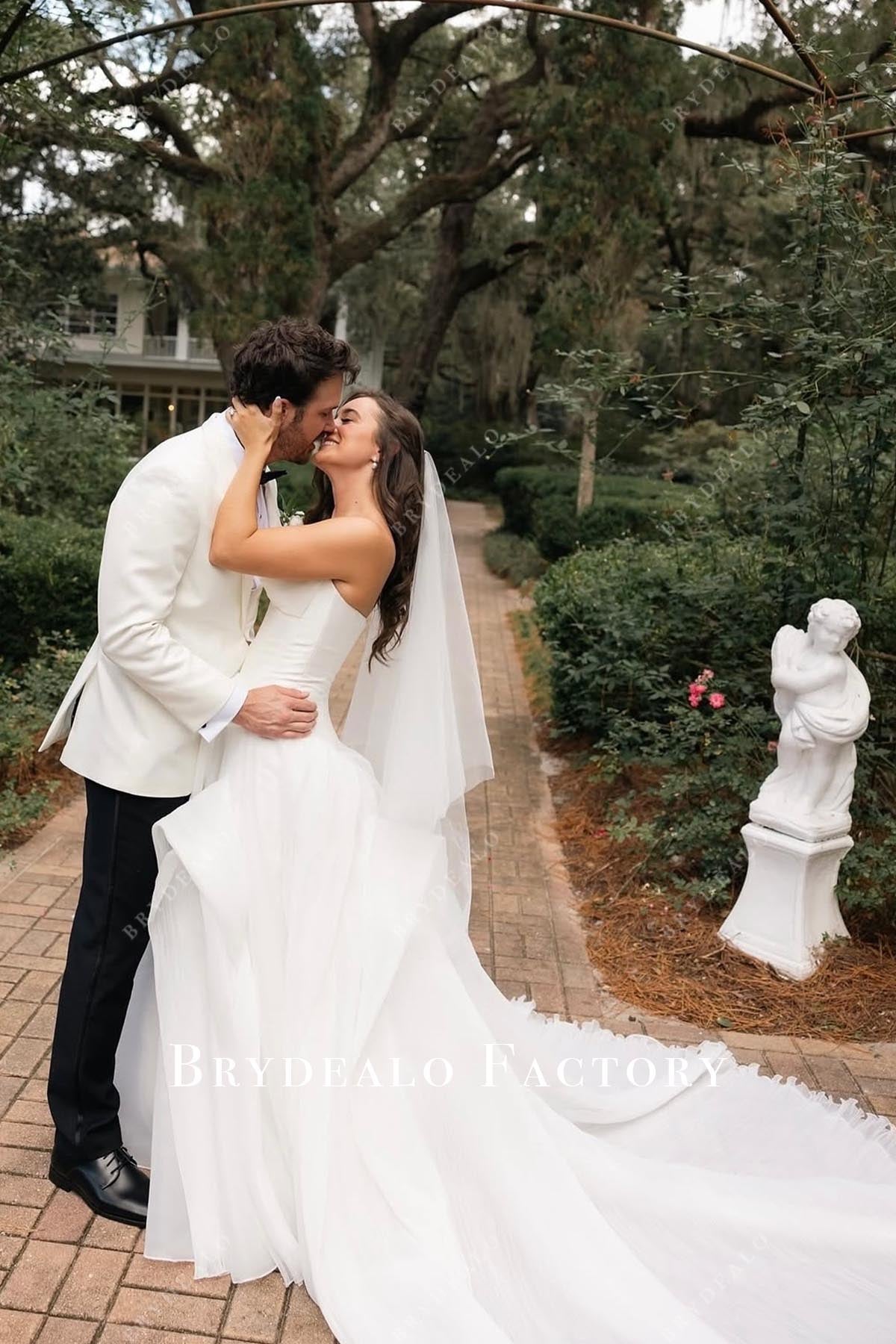 strapless ruffled wedding dress