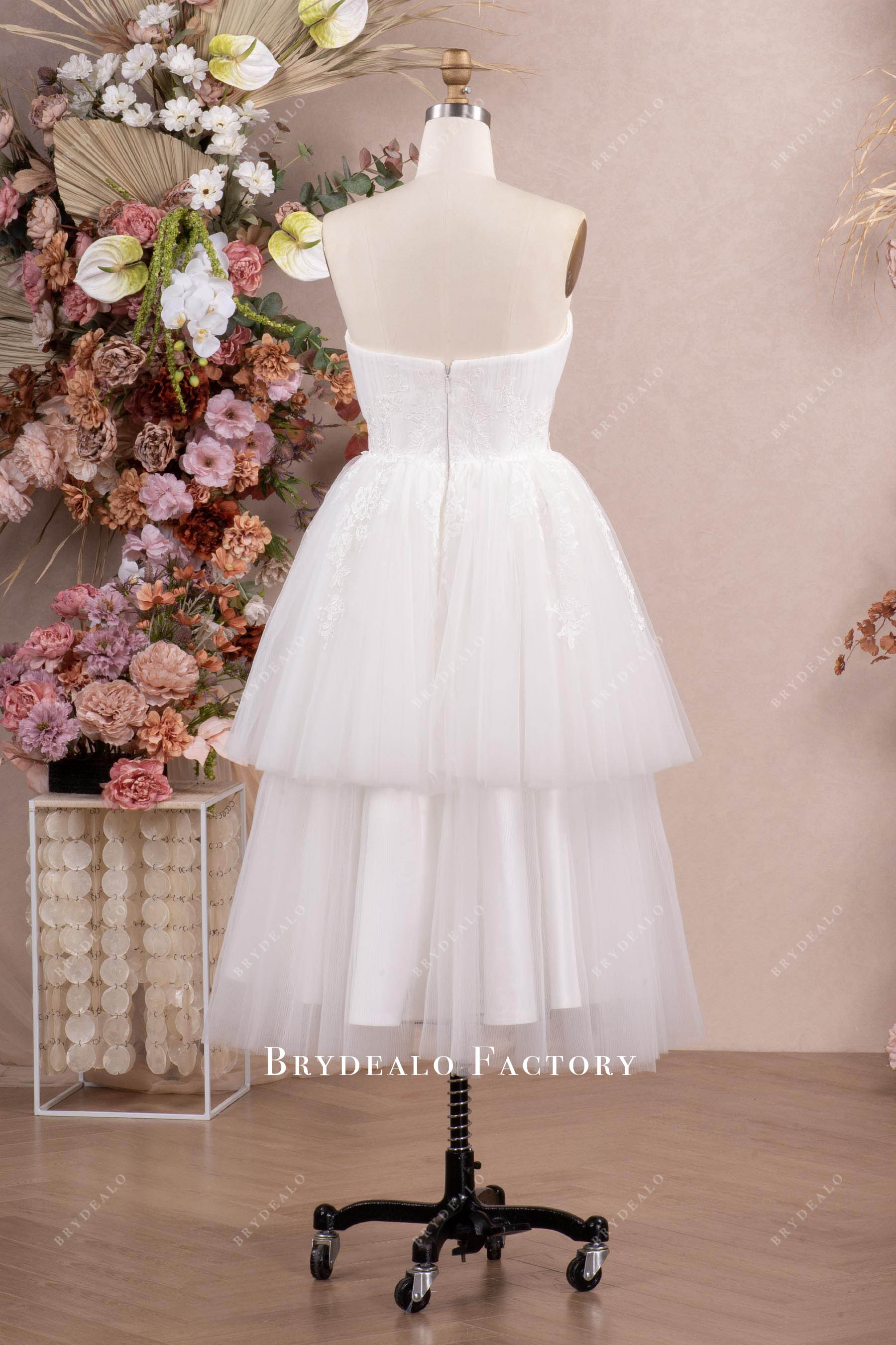 strapless tiered tulle ball gown wedding dress