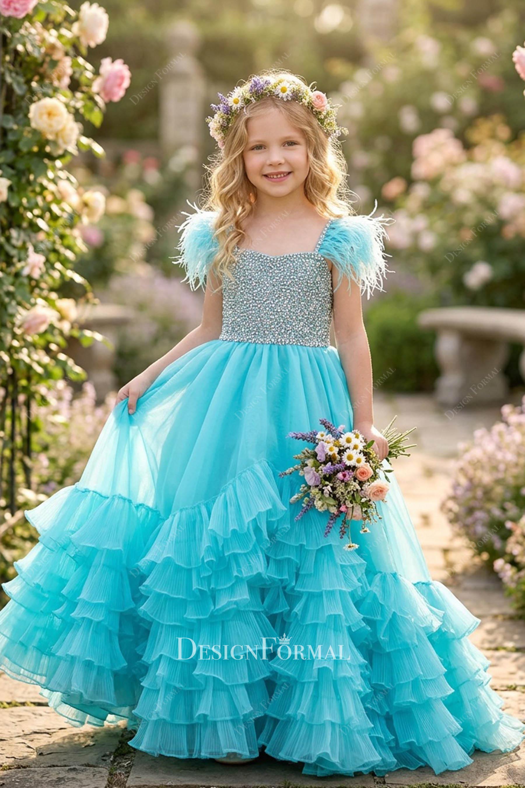 turquoise feather sleeve pageant gown