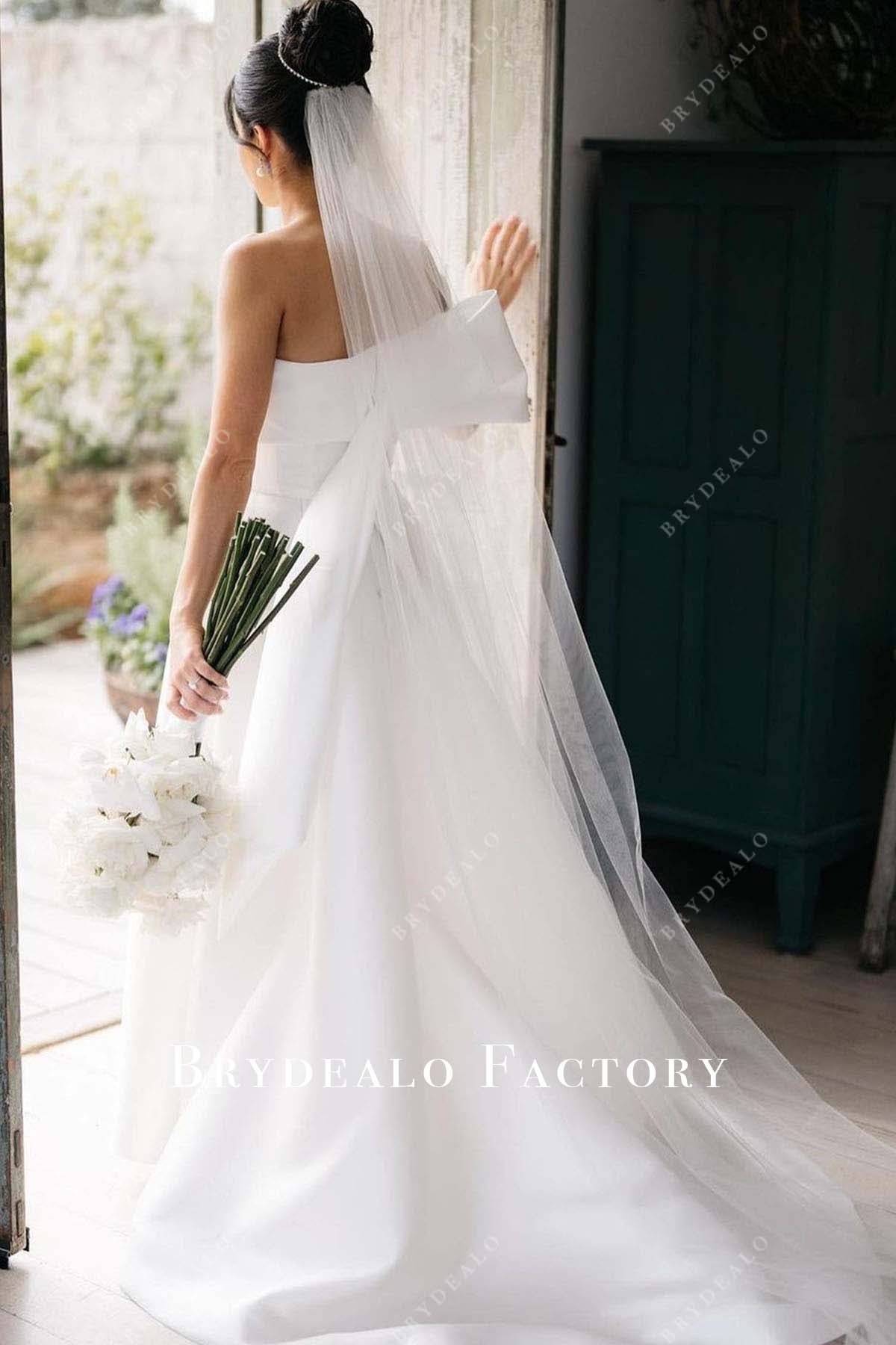 white bow wedding dress