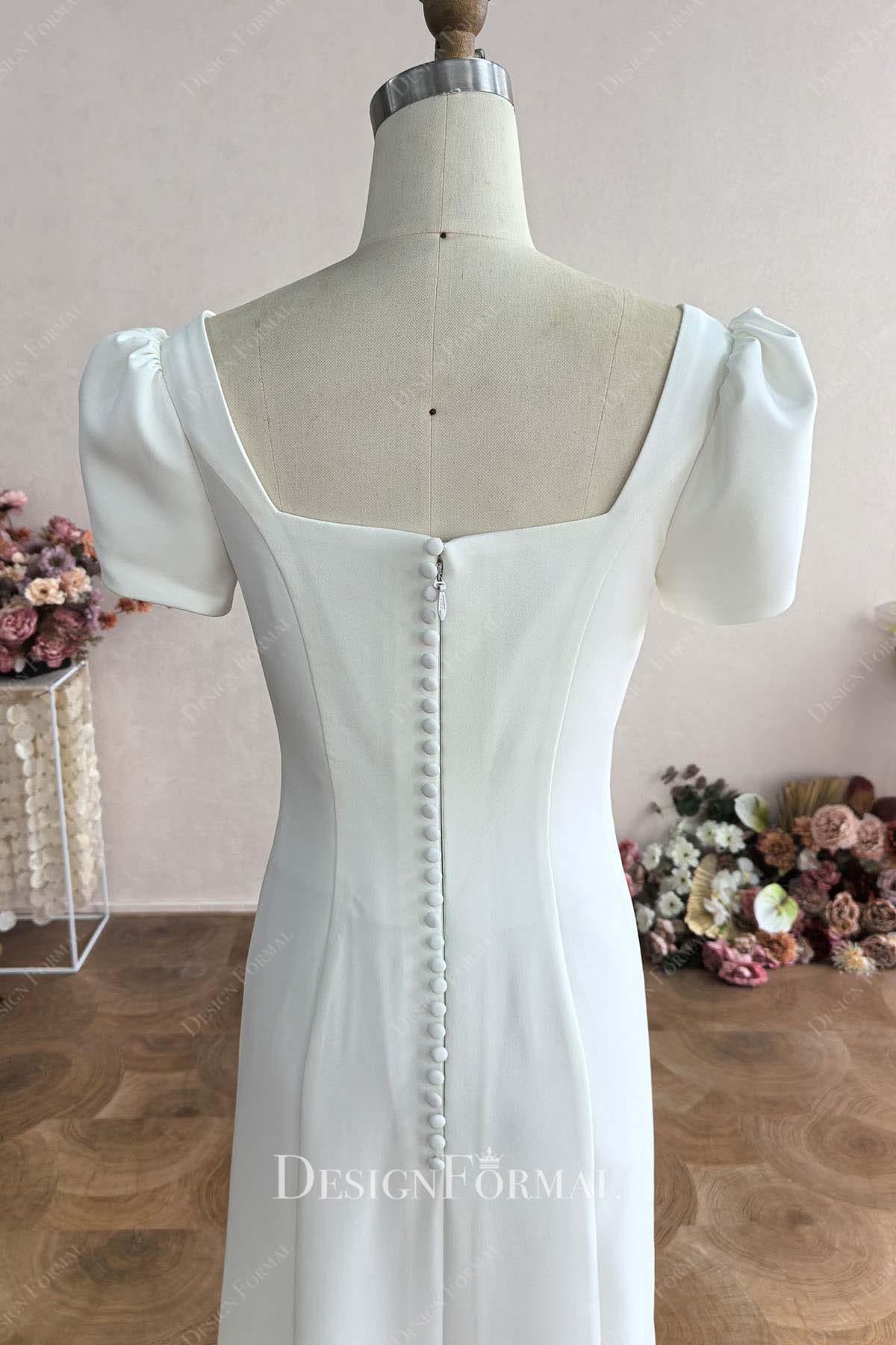 white crepe open back wedding dress