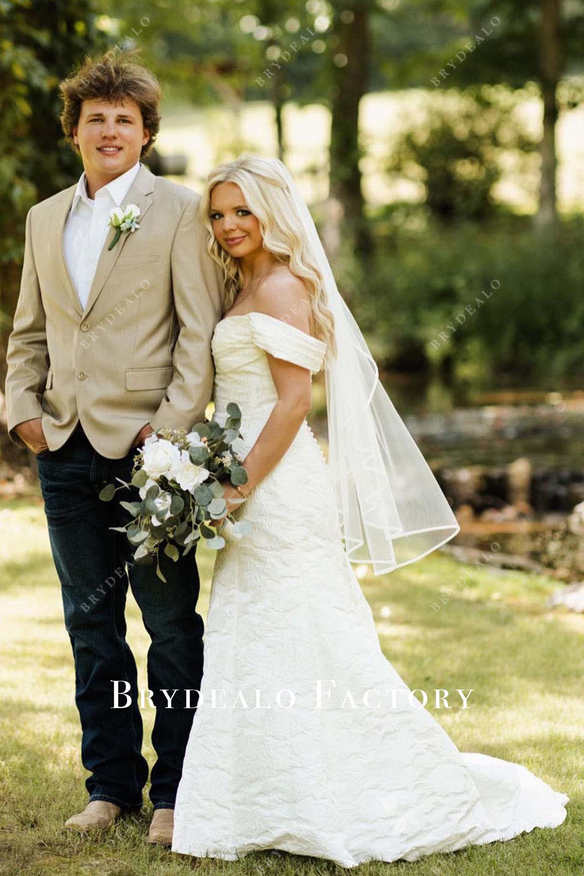 white off shoulder bridal dress