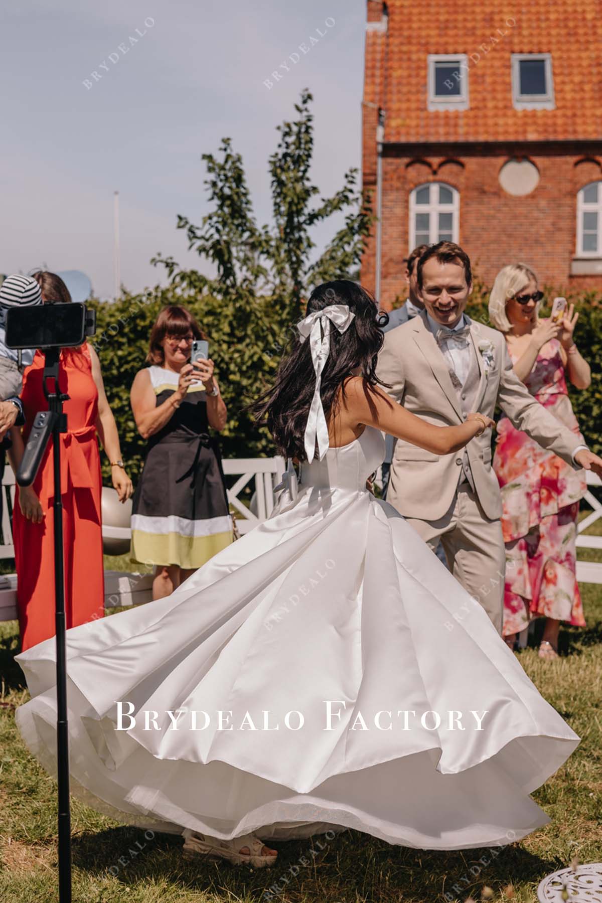 white satin ball gown wedding dress