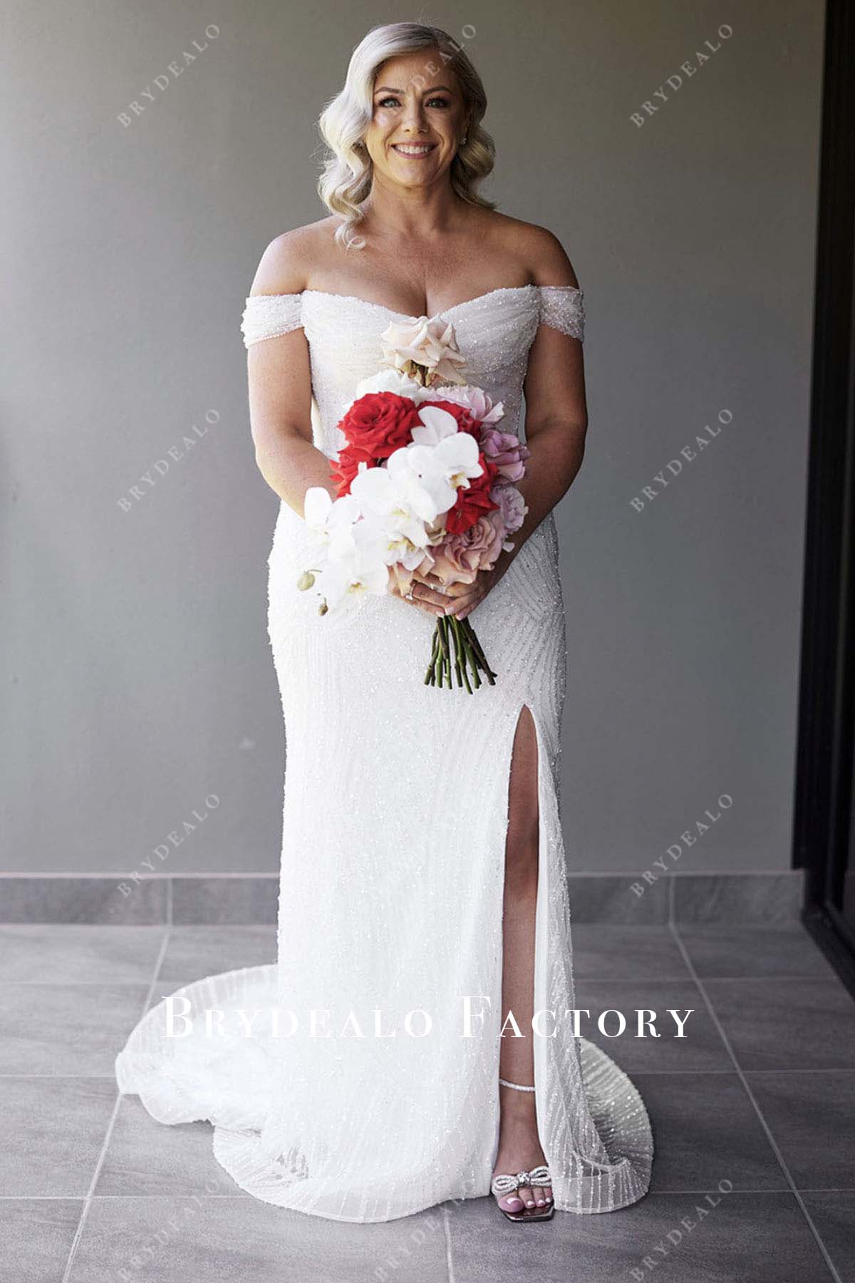 white shimmer off shoulder wedding dress