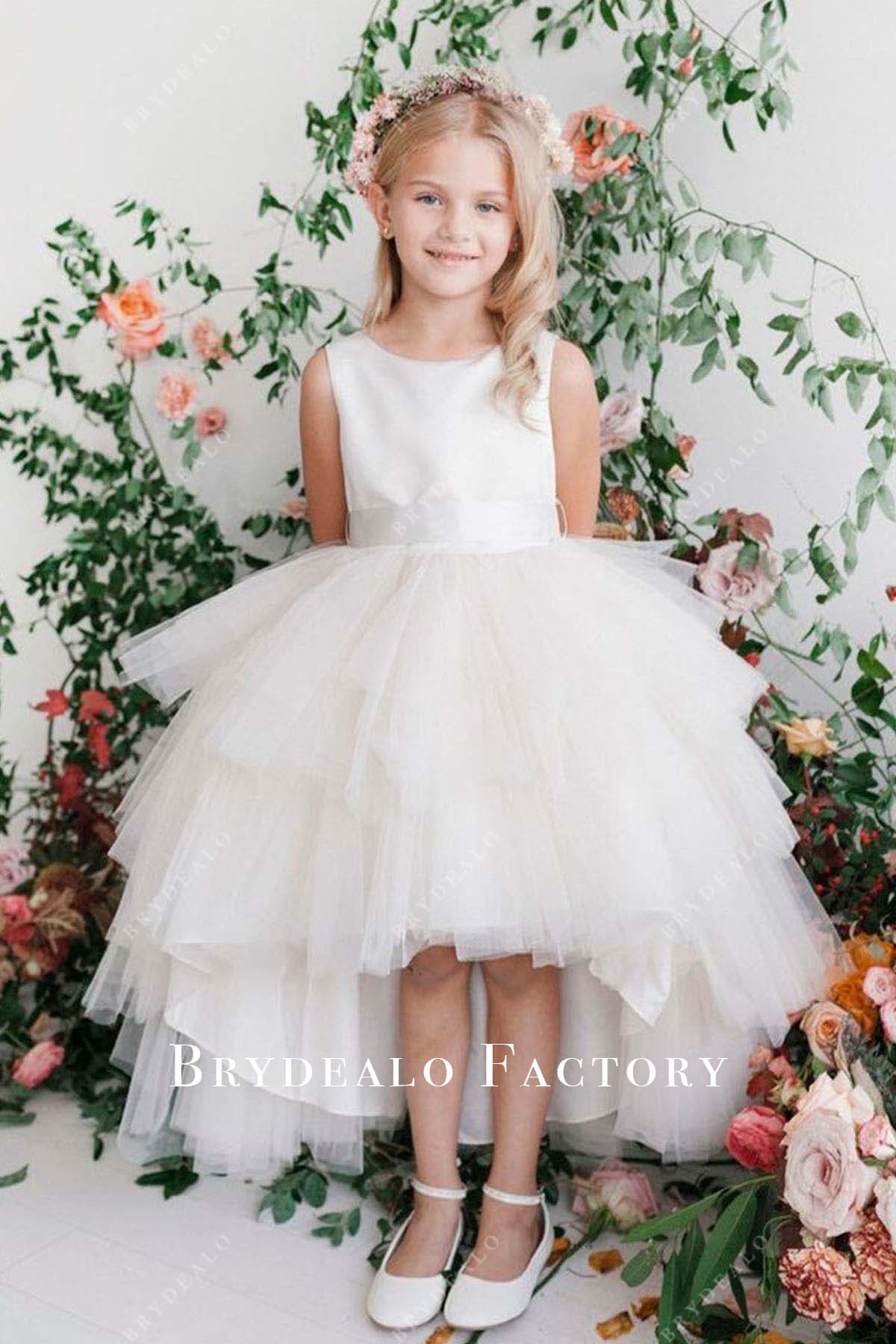 white sleeveless flower girl dress