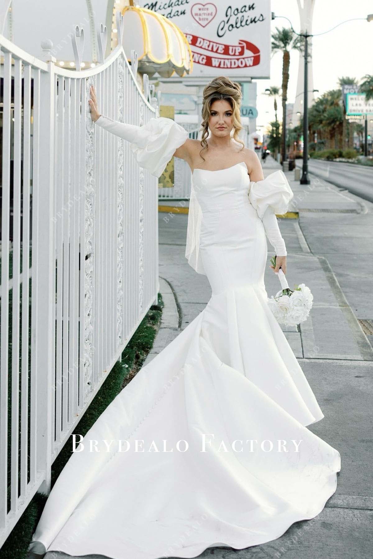 white trumpet long train wedding dress