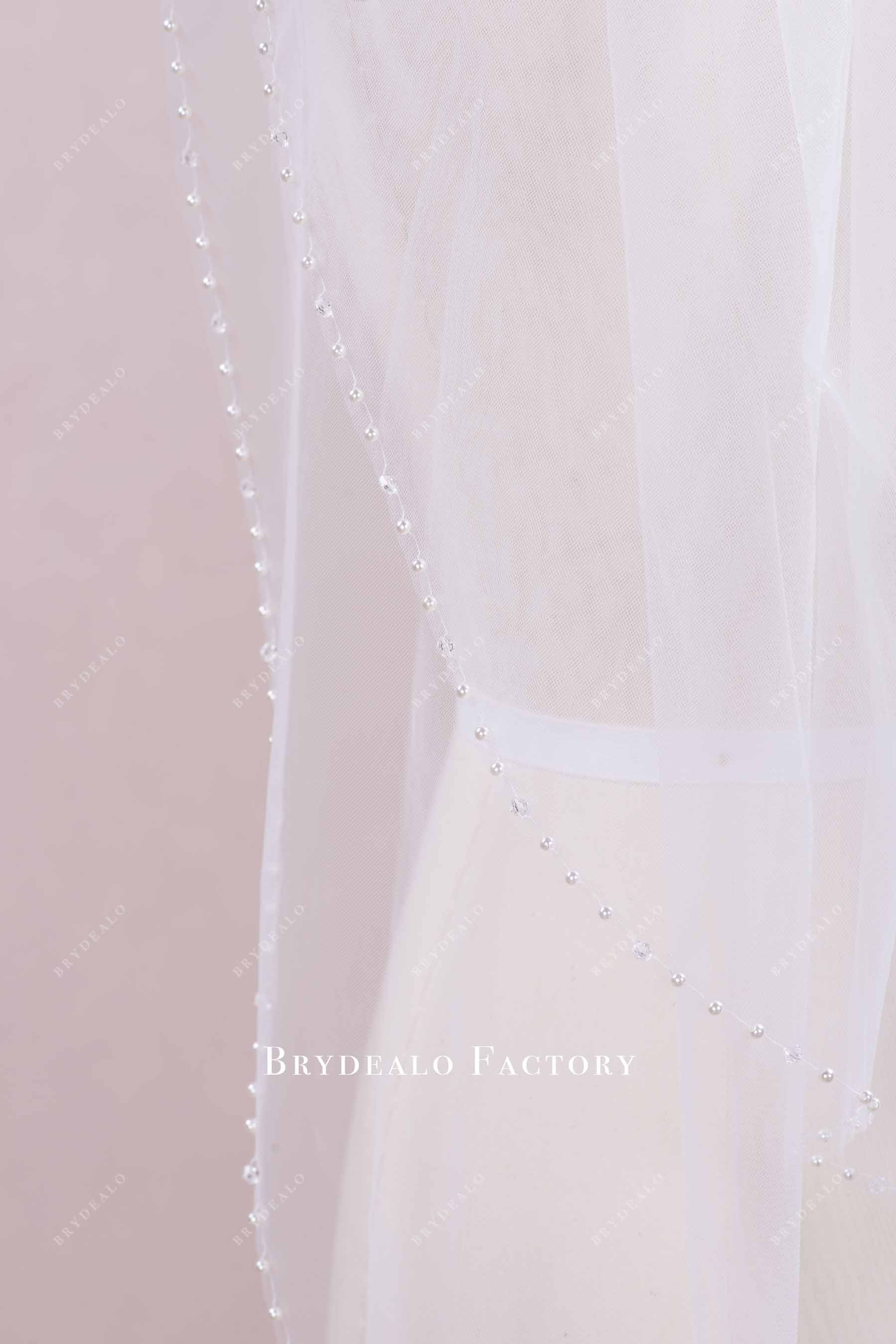 white tulle bride veil