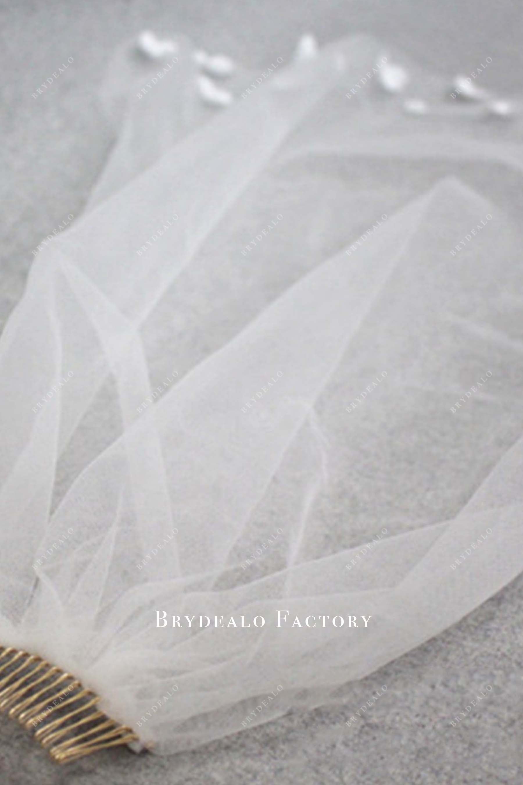 with comb raw cut bridal veil