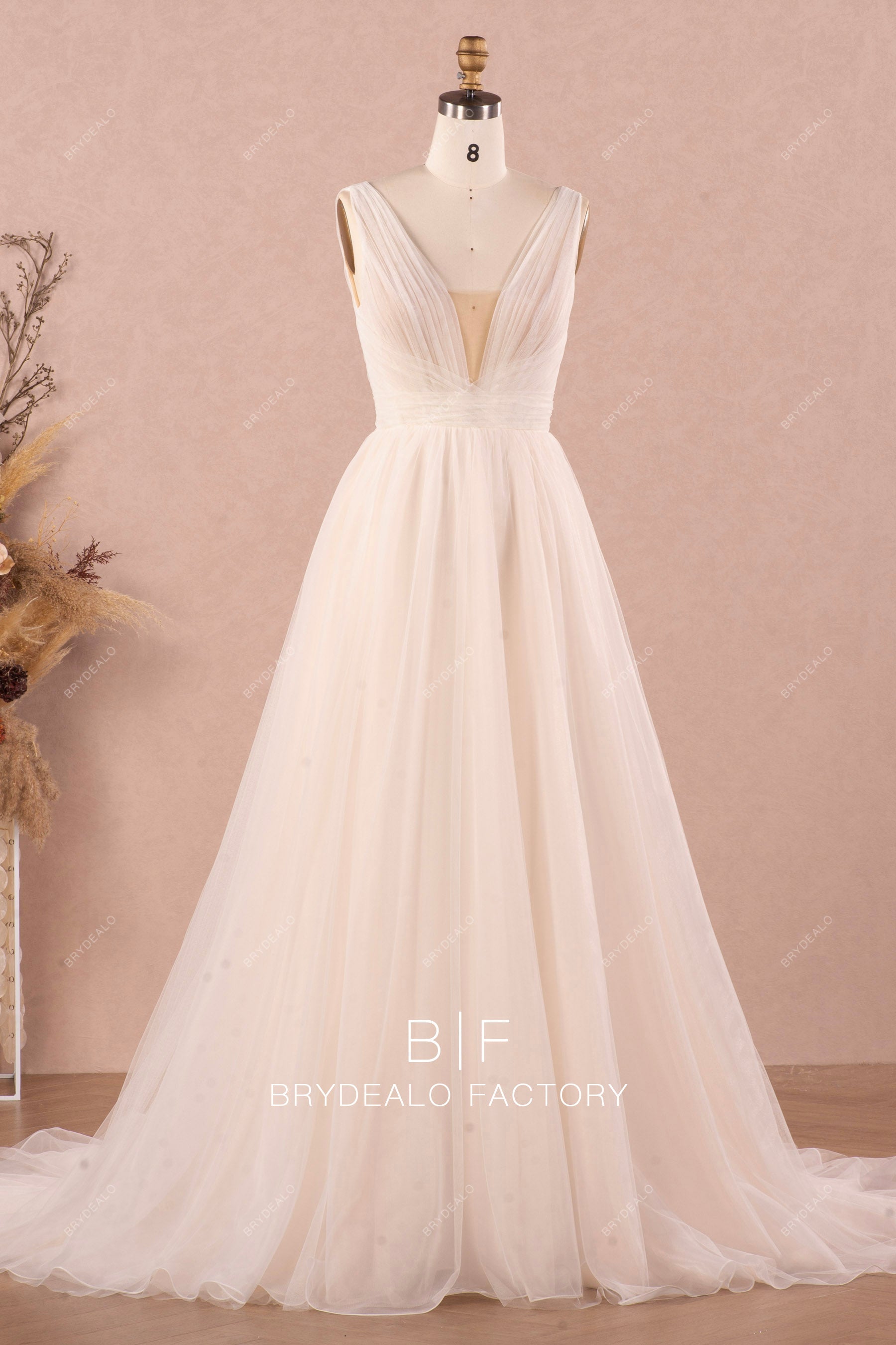 A-line pleated tulle V-neck designer wedding dress