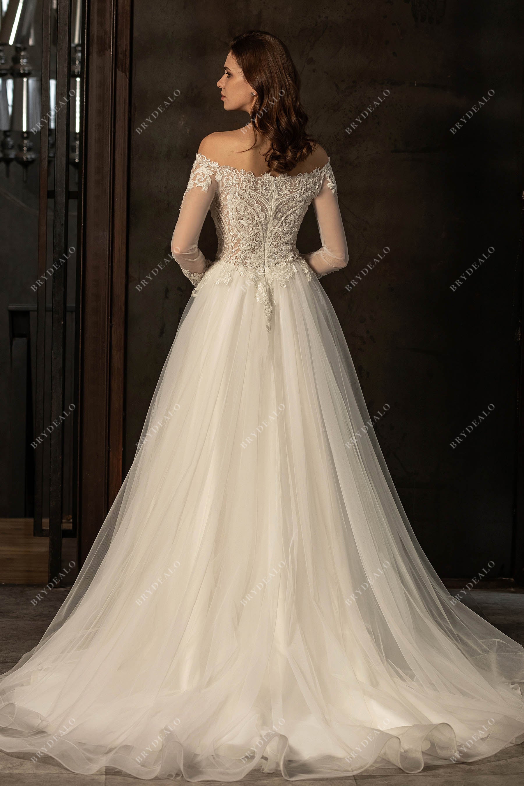 designer illusion long sleeves beaded lace A-line wedding gown