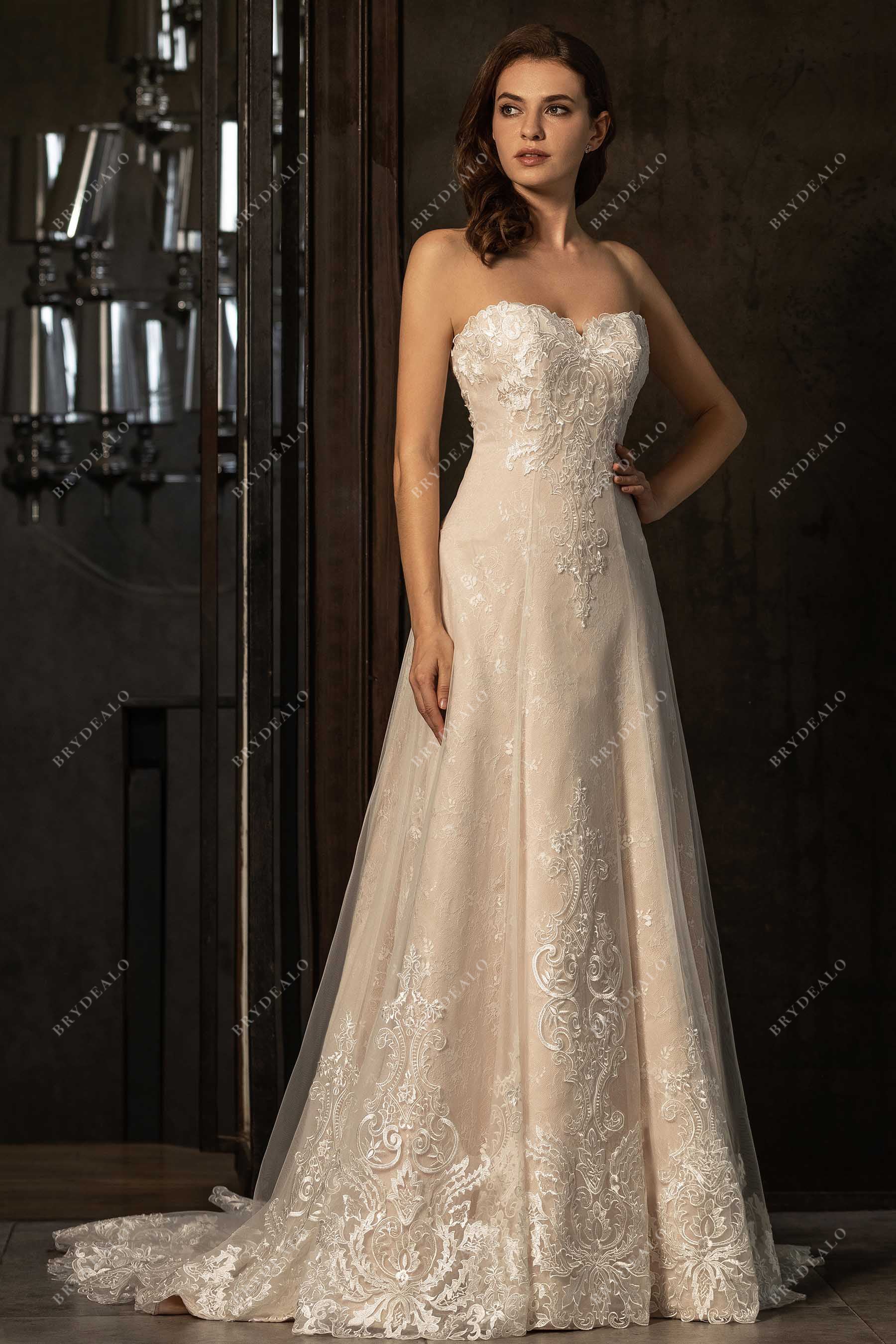 beautiful lace strapless nude court train wedding gown