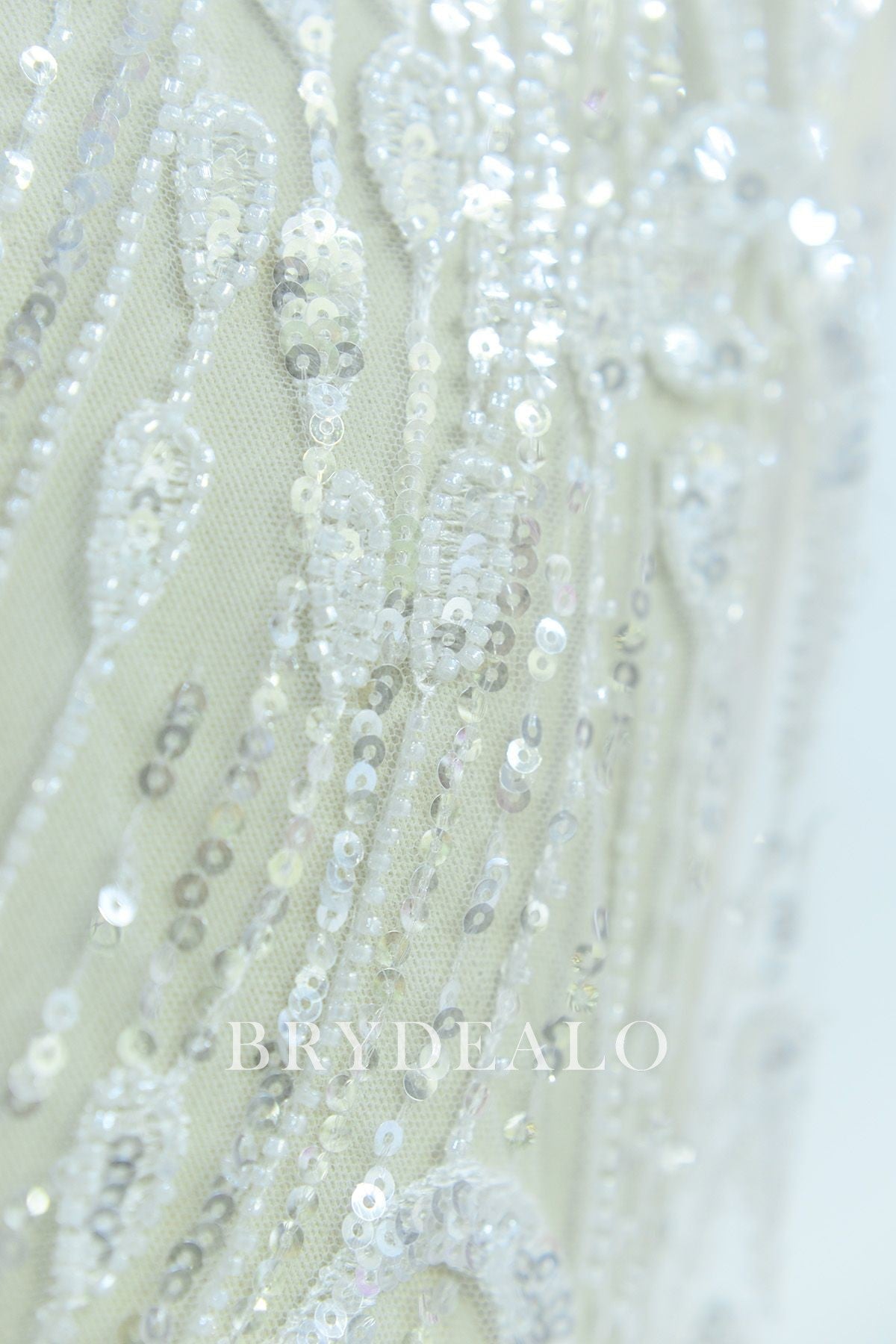 Best Luxurious Beaded Wave Pattern Lace Fabric Online
