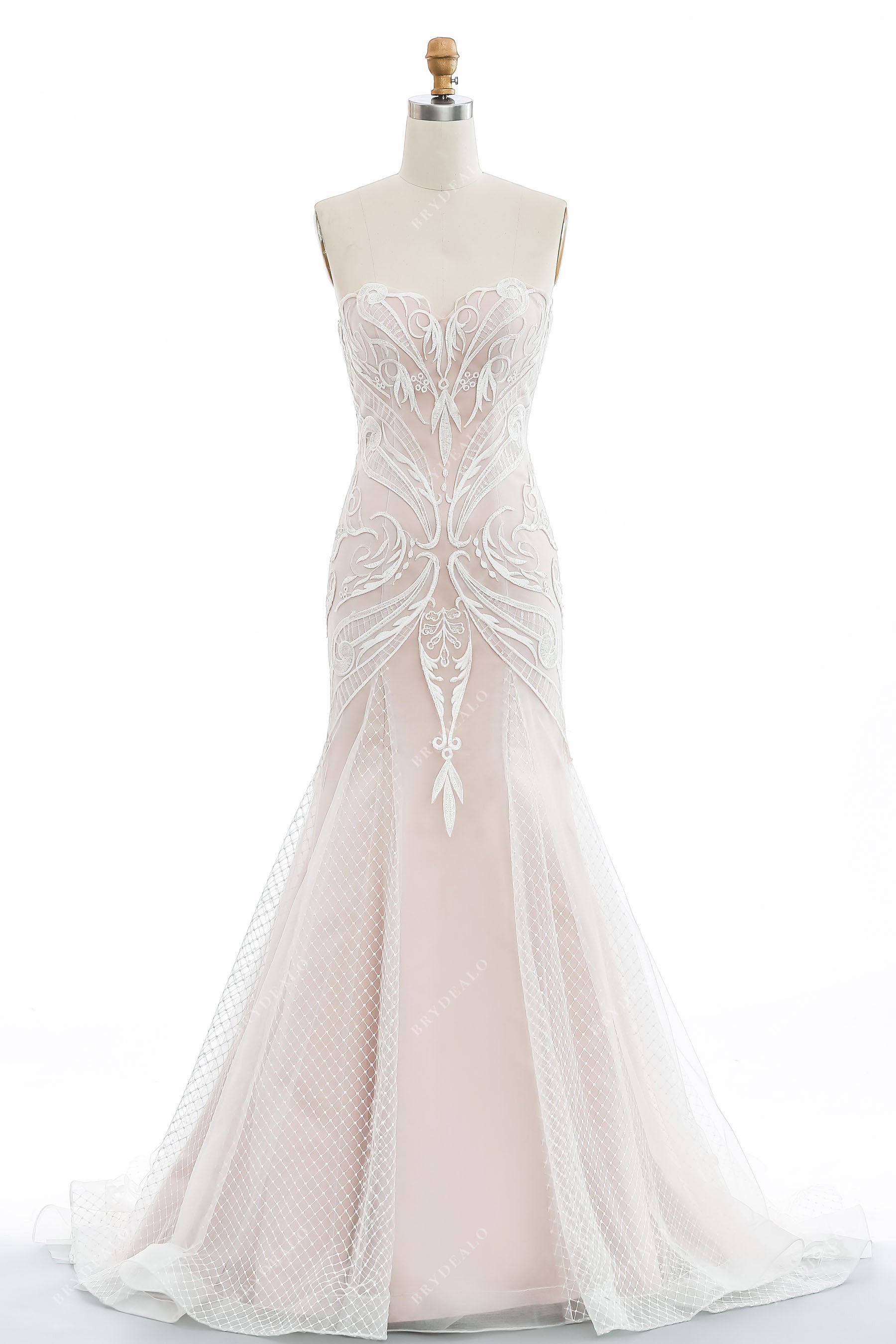 pearl pink strapless sweetheart fit and flare outdoor bridal gown