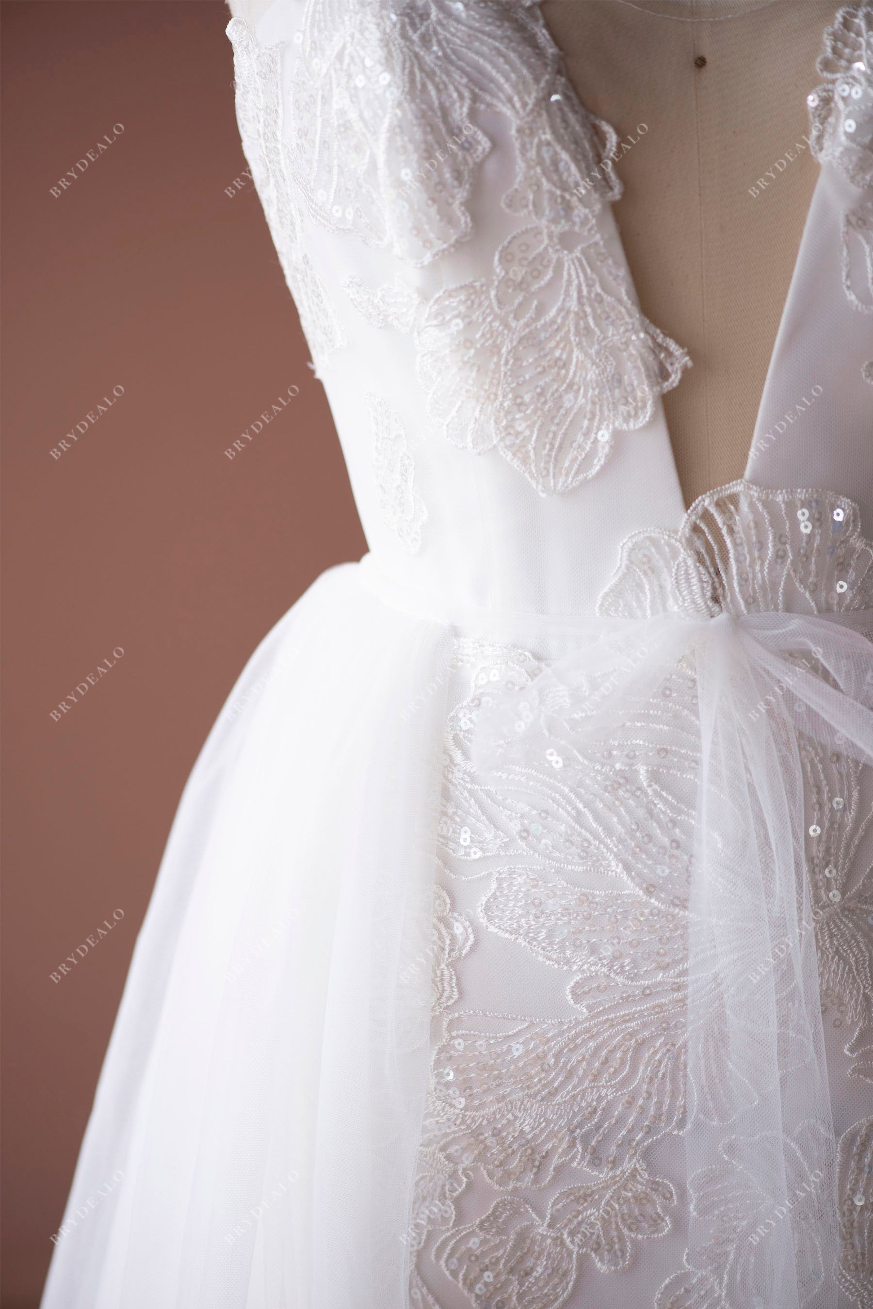 designer shiny lace deep V-neck bridal gown