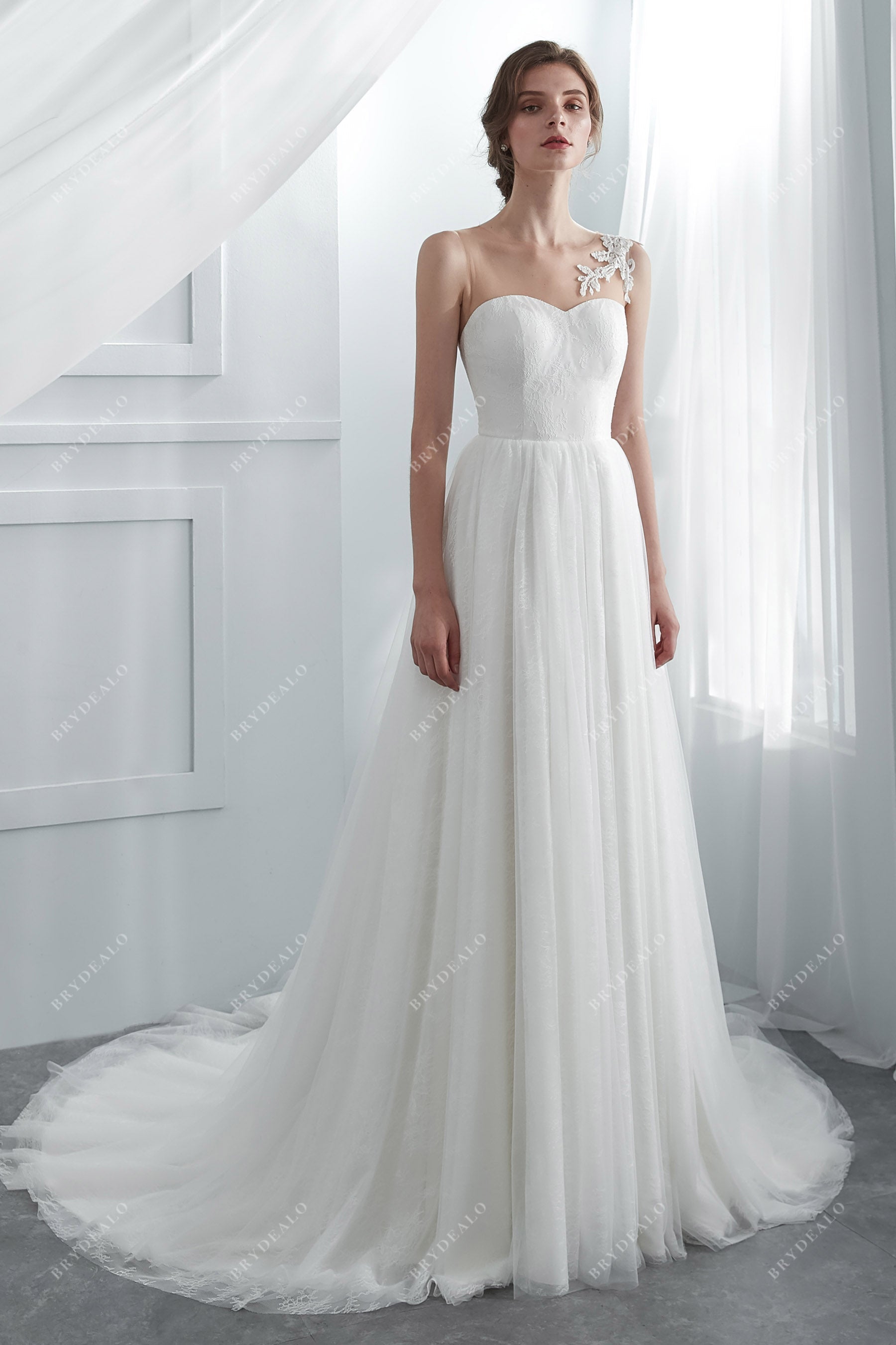 Designer Sleeveless Chapel Train Lace Bridal Gown