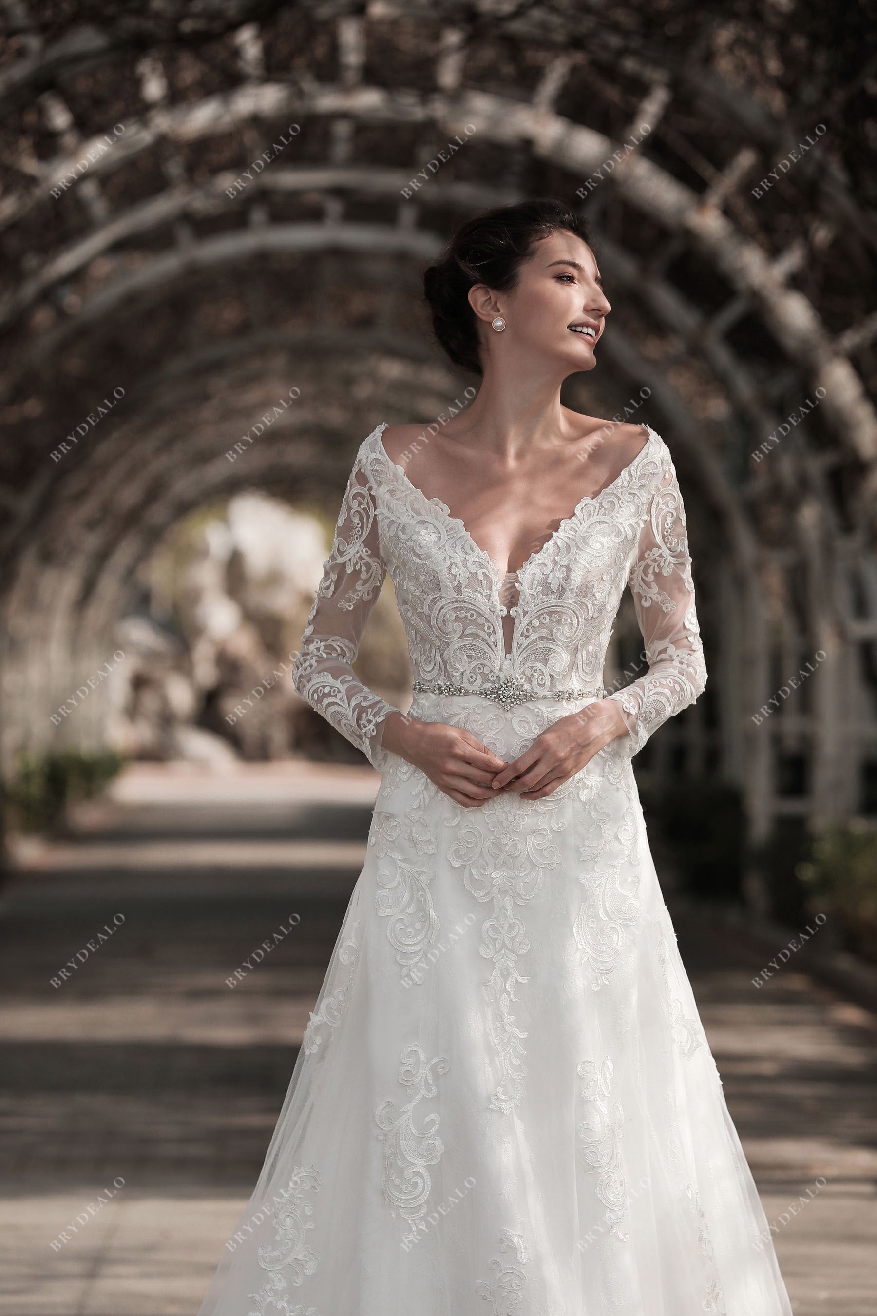 deep neck sheer sleeves lace bridal gown