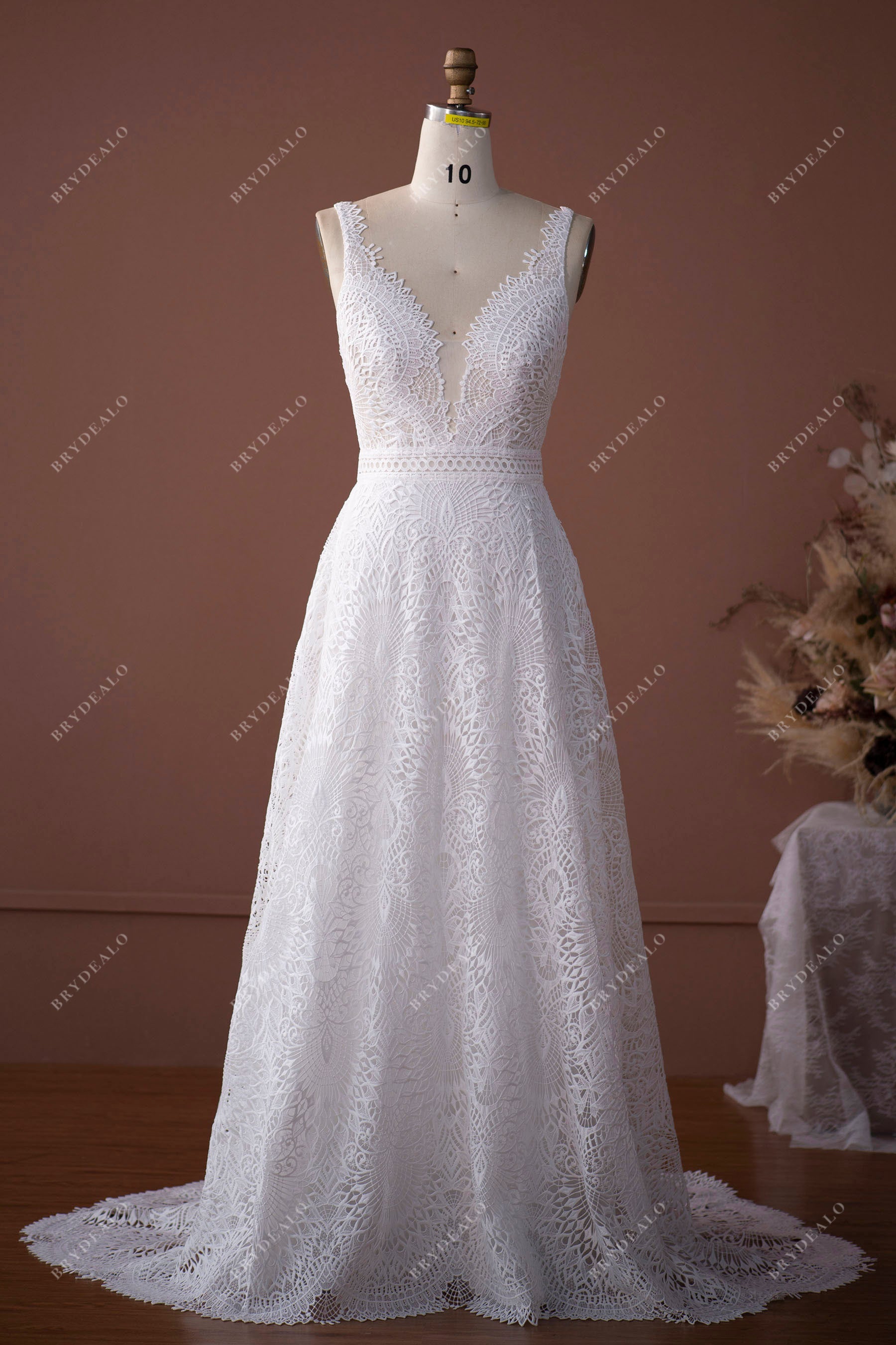 designer lace sleeveless bridal gown