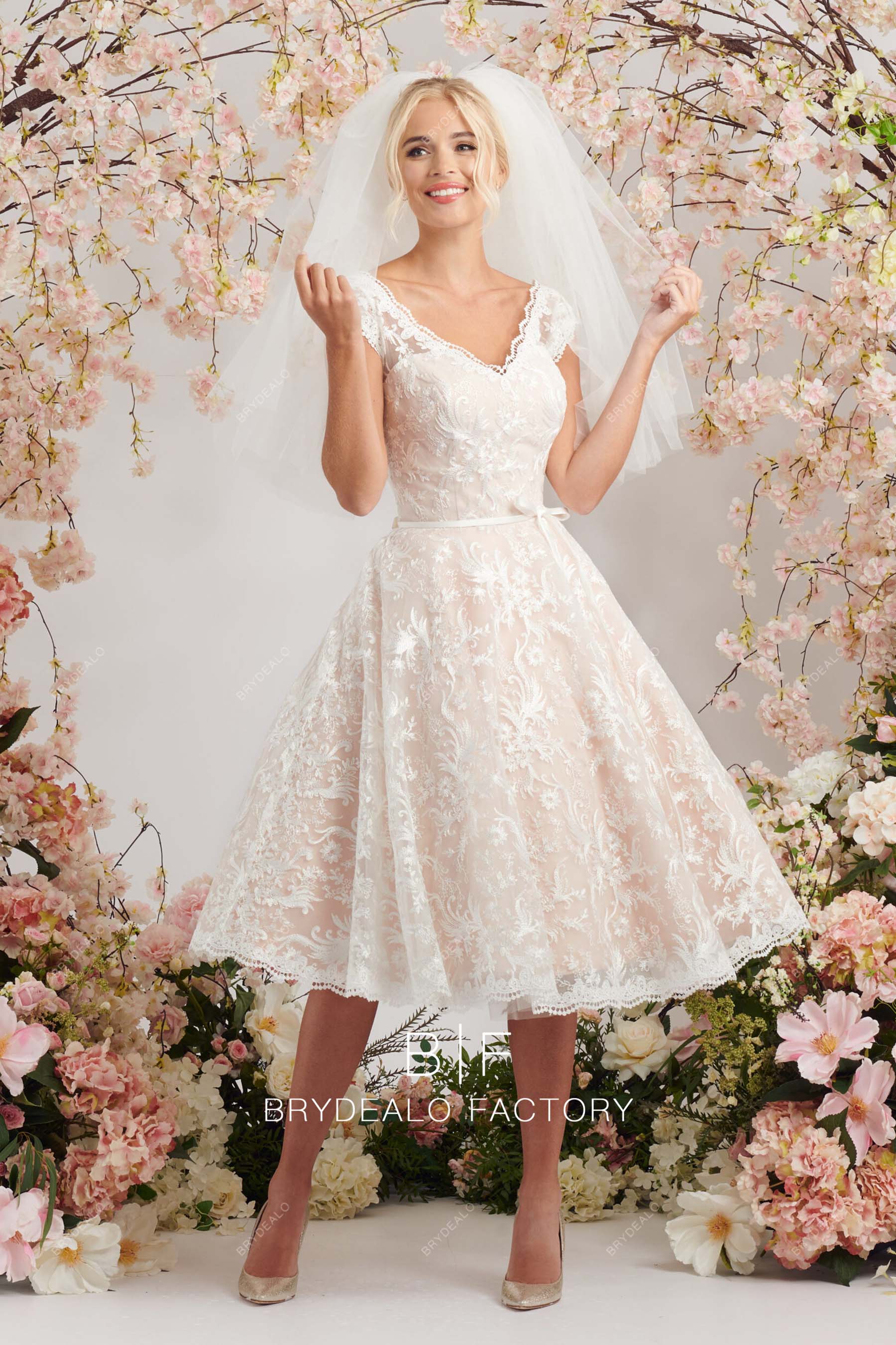 cute V-neck cap sleeves lace blush short wedding gown
