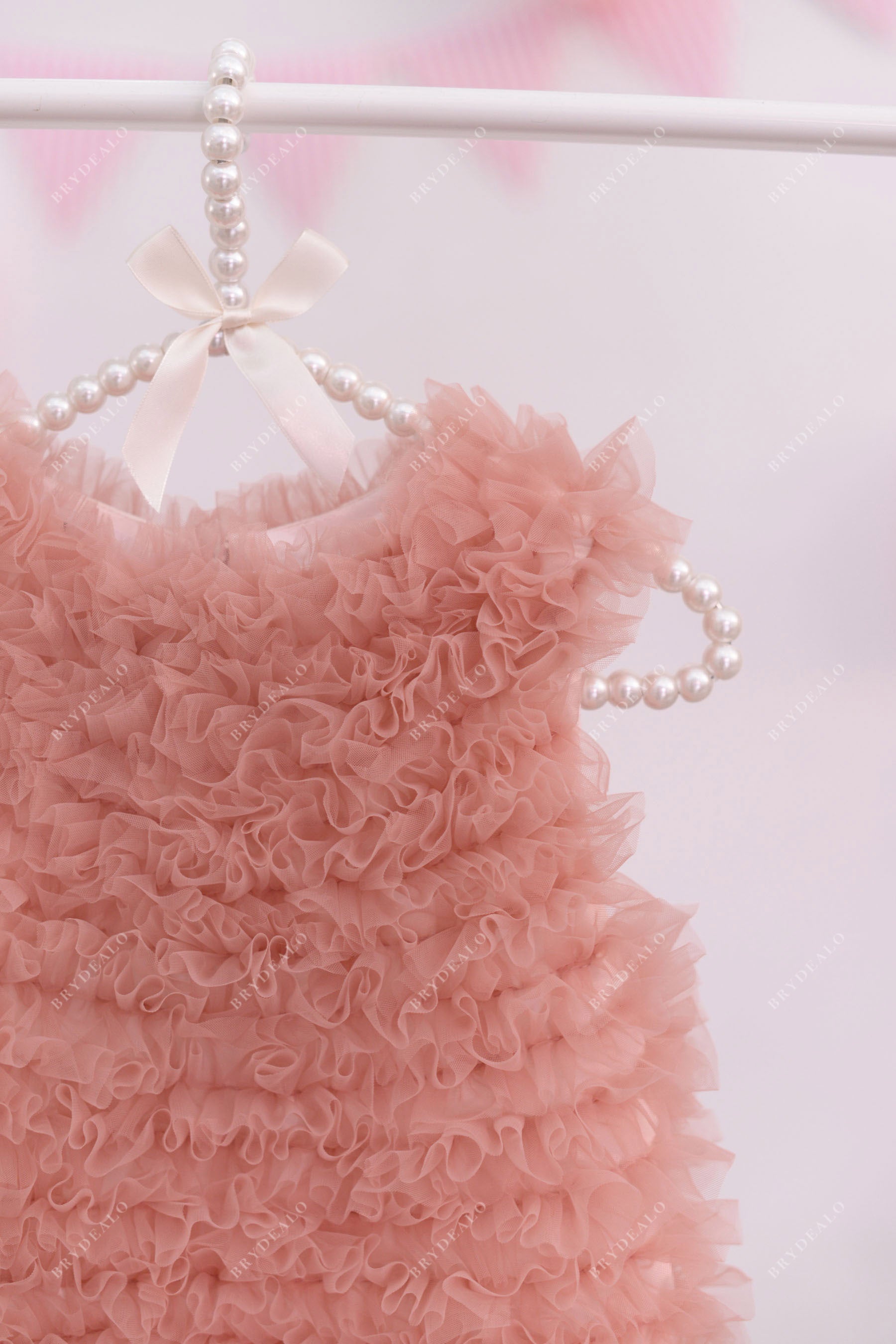 designer pink sleeveless ruffled tulle flower girl dress for wedding