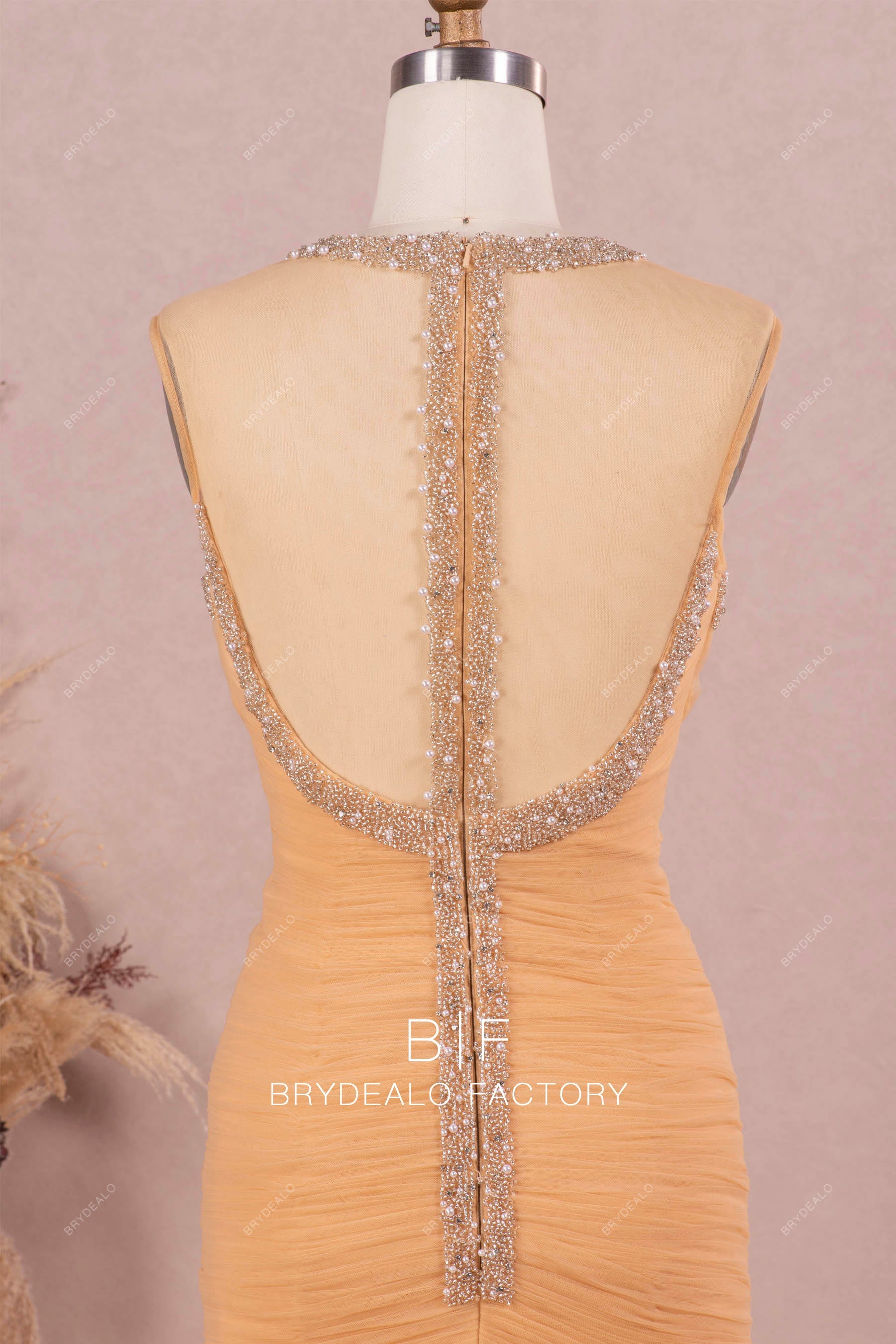 designer beaded illusion back gold wedding gown