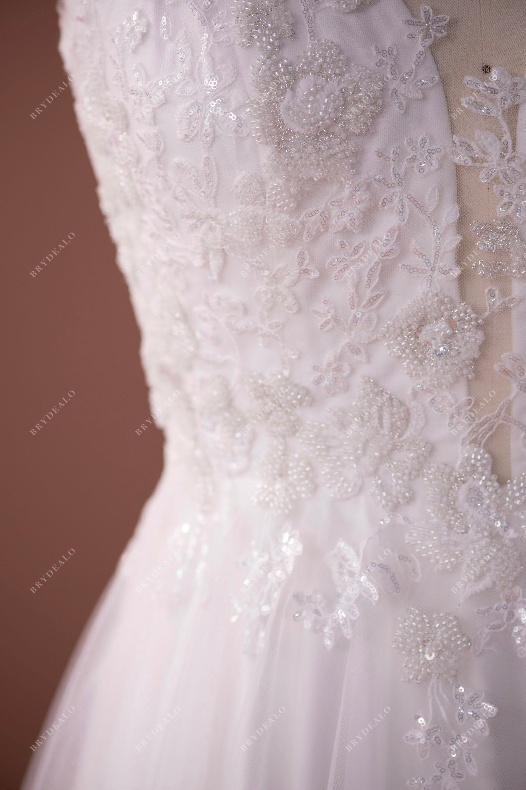 gorgeous beaded lace fabric bridal dress