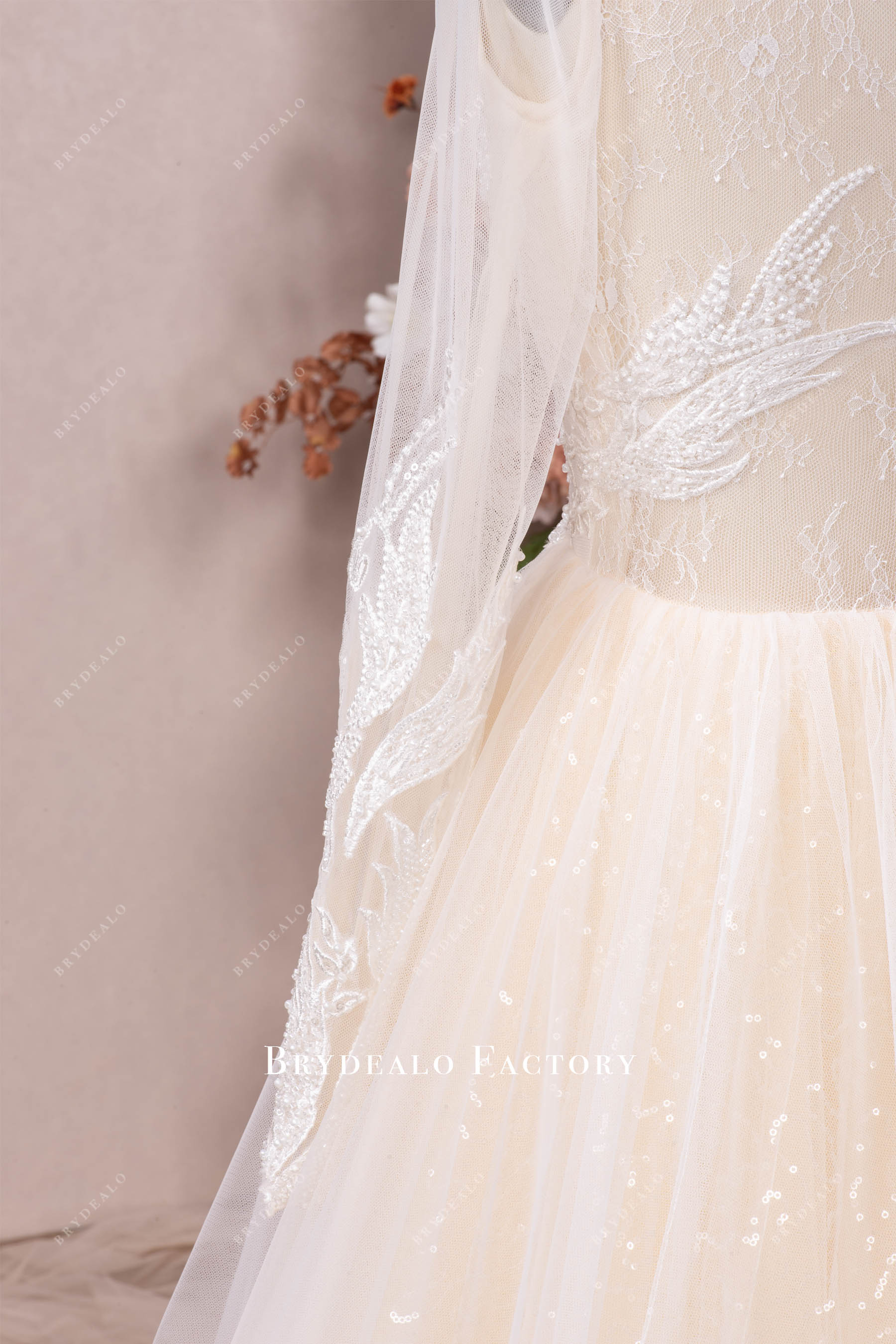 sheer long sleeves destination bridal gown