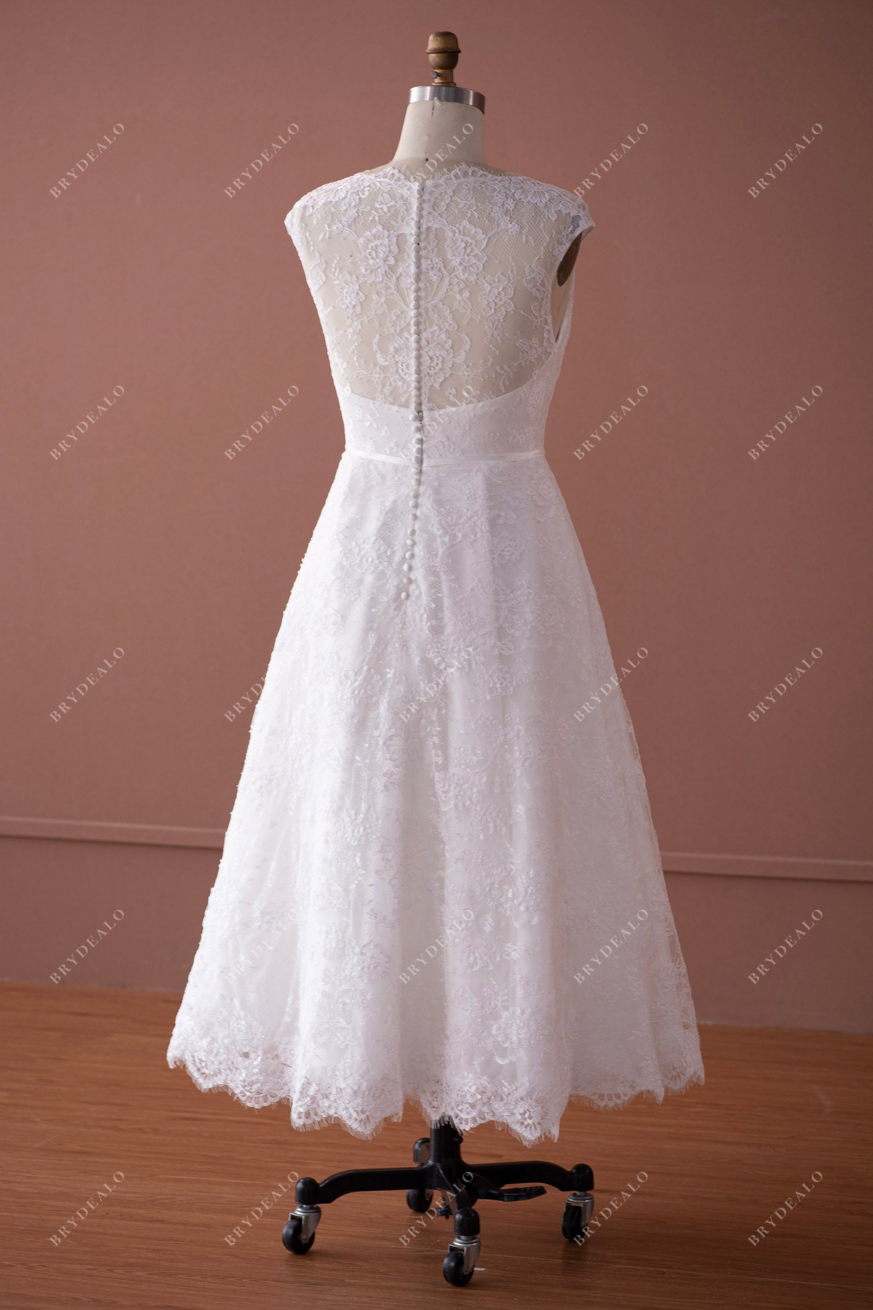 illusion back tea length city bridal gown