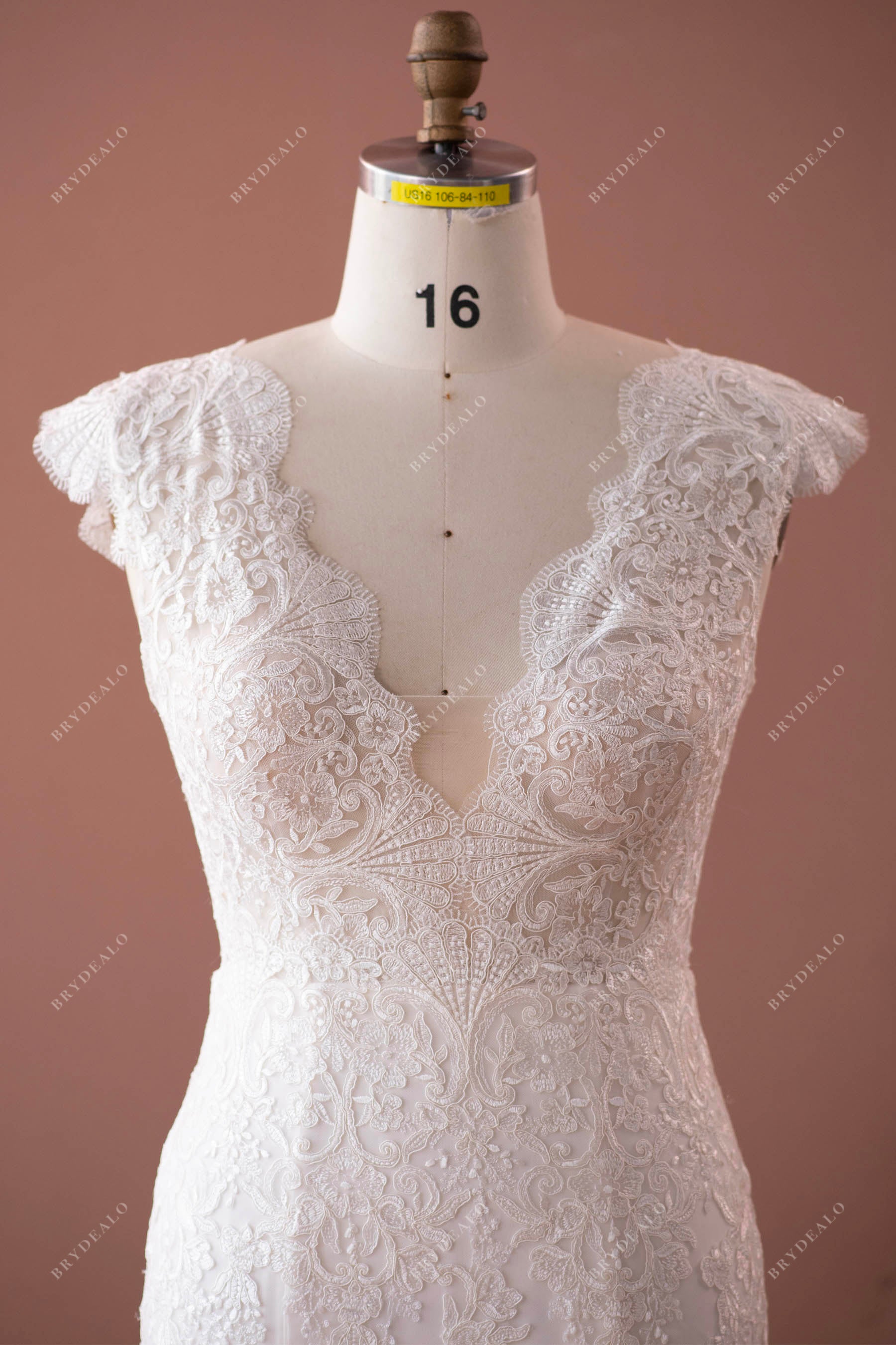 plus size cap sleeves plunging lace wedding gown